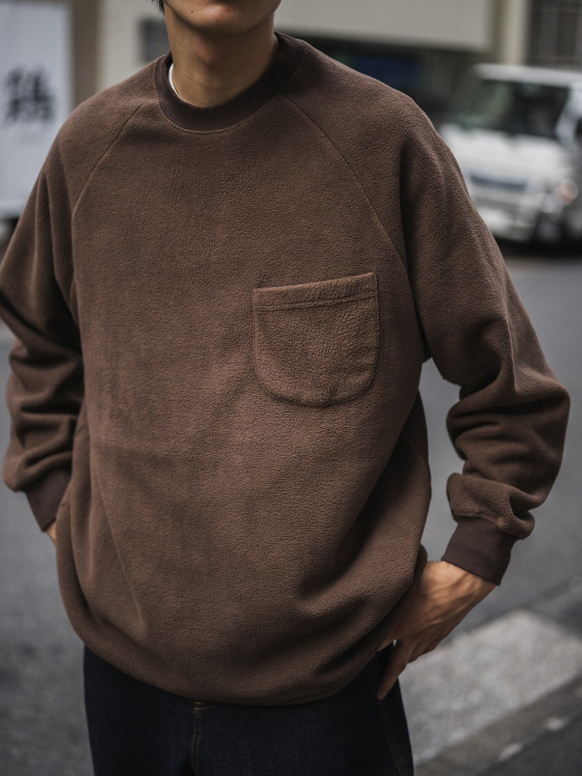 A Eckhaus Latta Shirt pictured on a model in front of a white background. The title of the product is Eckhaus Latta Eclipse Turtleneck - Stone and the image was taken by 199A®.