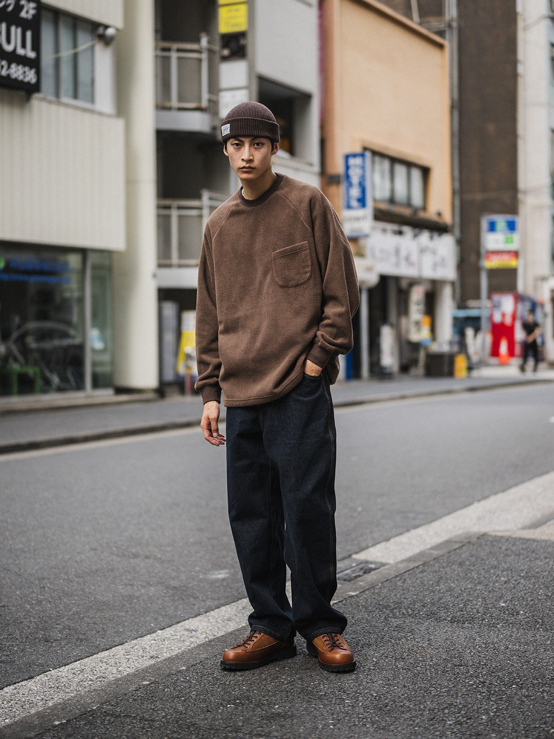 A Eckhaus Latta Shirt pictured on a model in front of a white background. The title of the product is Eckhaus Latta Eclipse Turtleneck - Stone and the image was taken by 199A®.