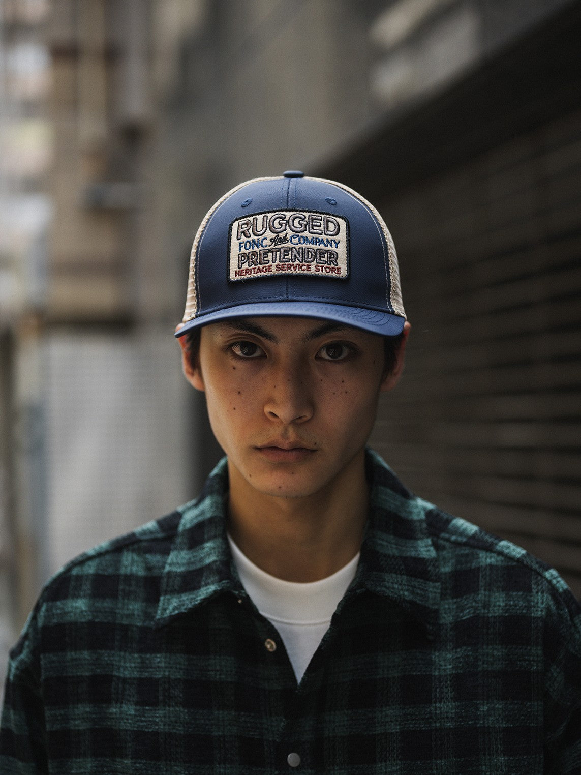 A Eckhaus Latta Shirt pictured on a model in front of a white background. The title of the product is Eckhaus Latta Eclipse Turtleneck - Stone and the image was taken by 199A®.