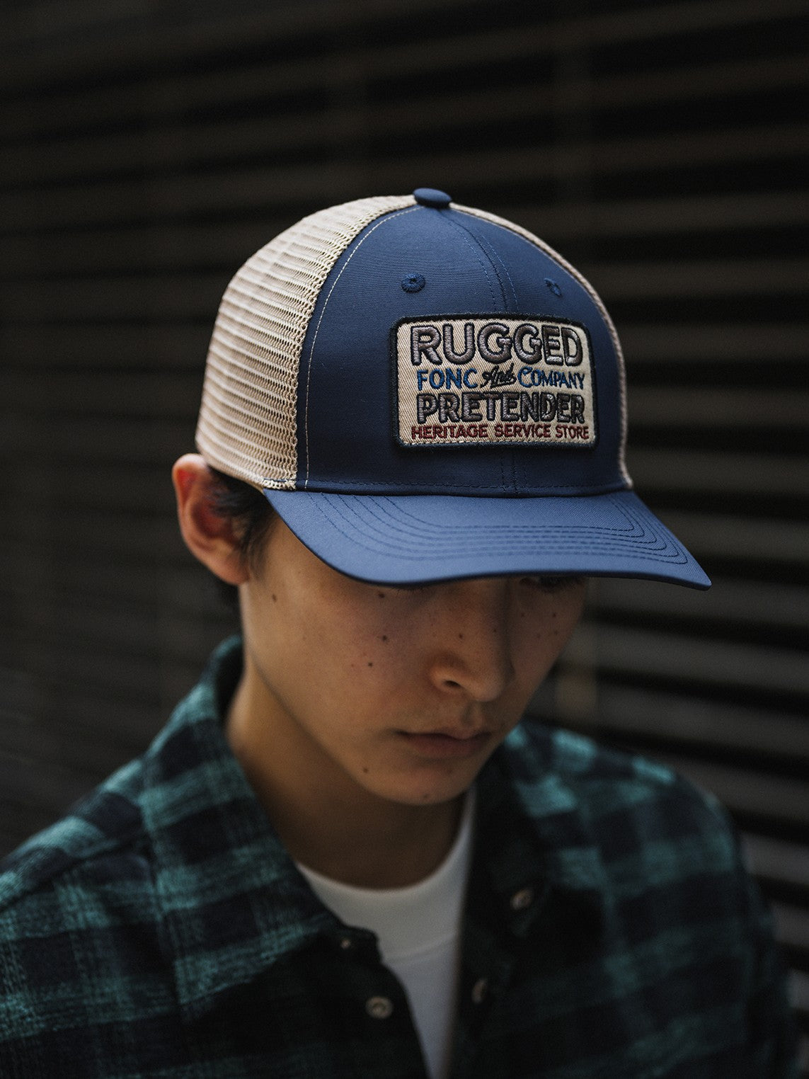 A Eckhaus Latta Shirt pictured on a model in front of a white background. The title of the product is Eckhaus Latta Eclipse Turtleneck - Stone and the image was taken by 199A®.