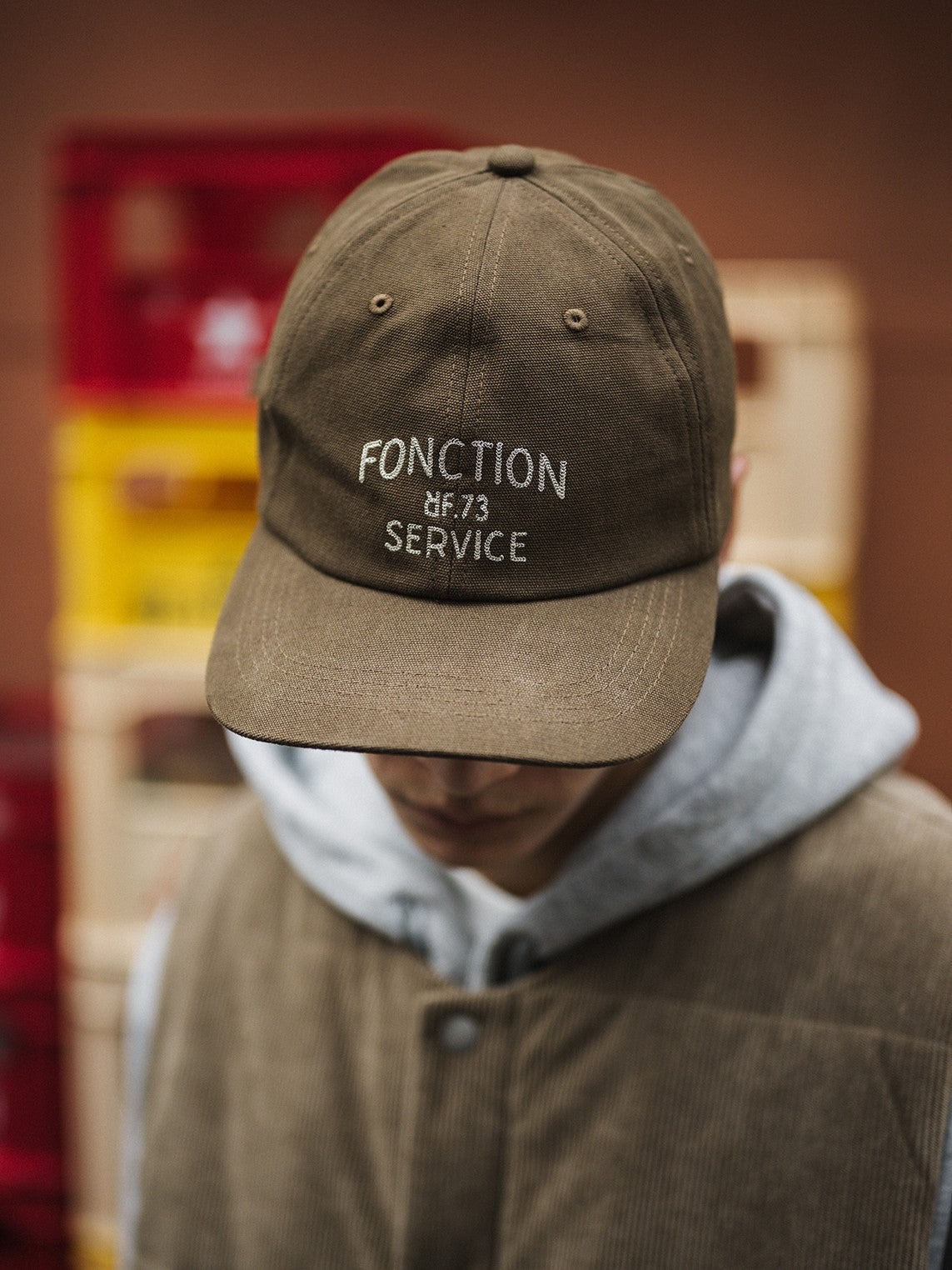 A Eckhaus Latta Shirt pictured on a model in front of a white background. The title of the product is Eckhaus Latta Eclipse Turtleneck - Stone and the image was taken by 199A®.