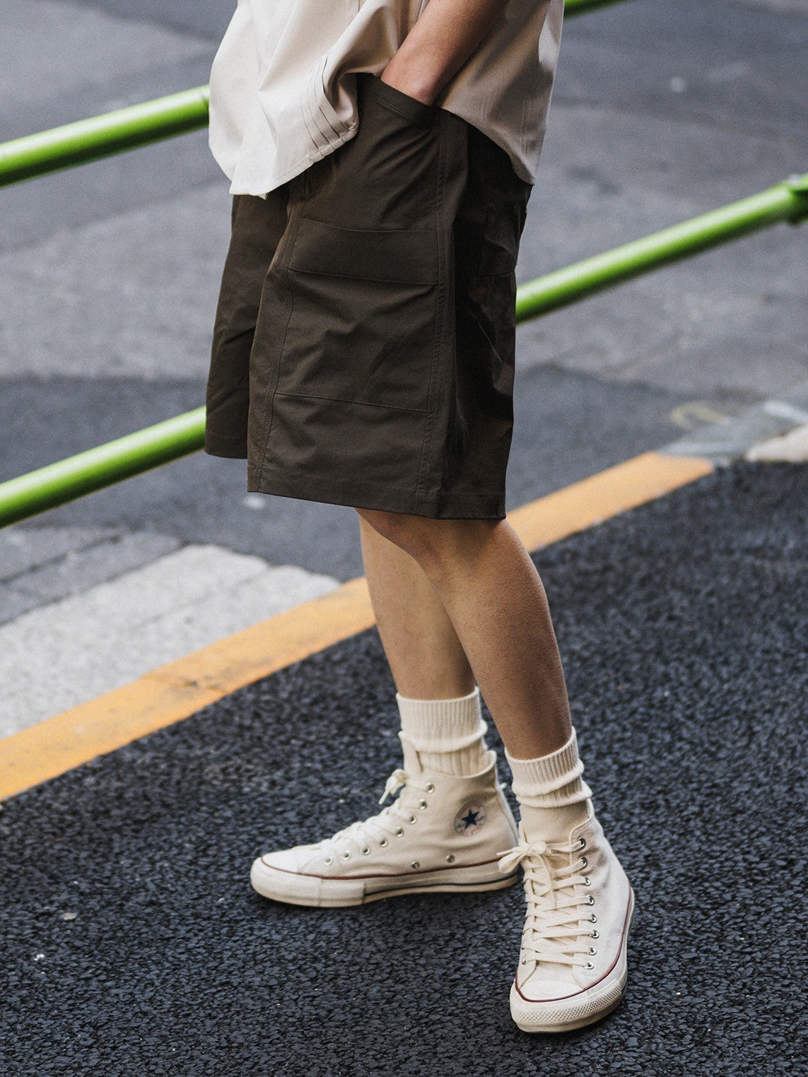 A Eckhaus Latta Shirt pictured on a model in front of a white background. The title of the product is Eckhaus Latta Eclipse Turtleneck - Stone and the image was taken by 199A®.