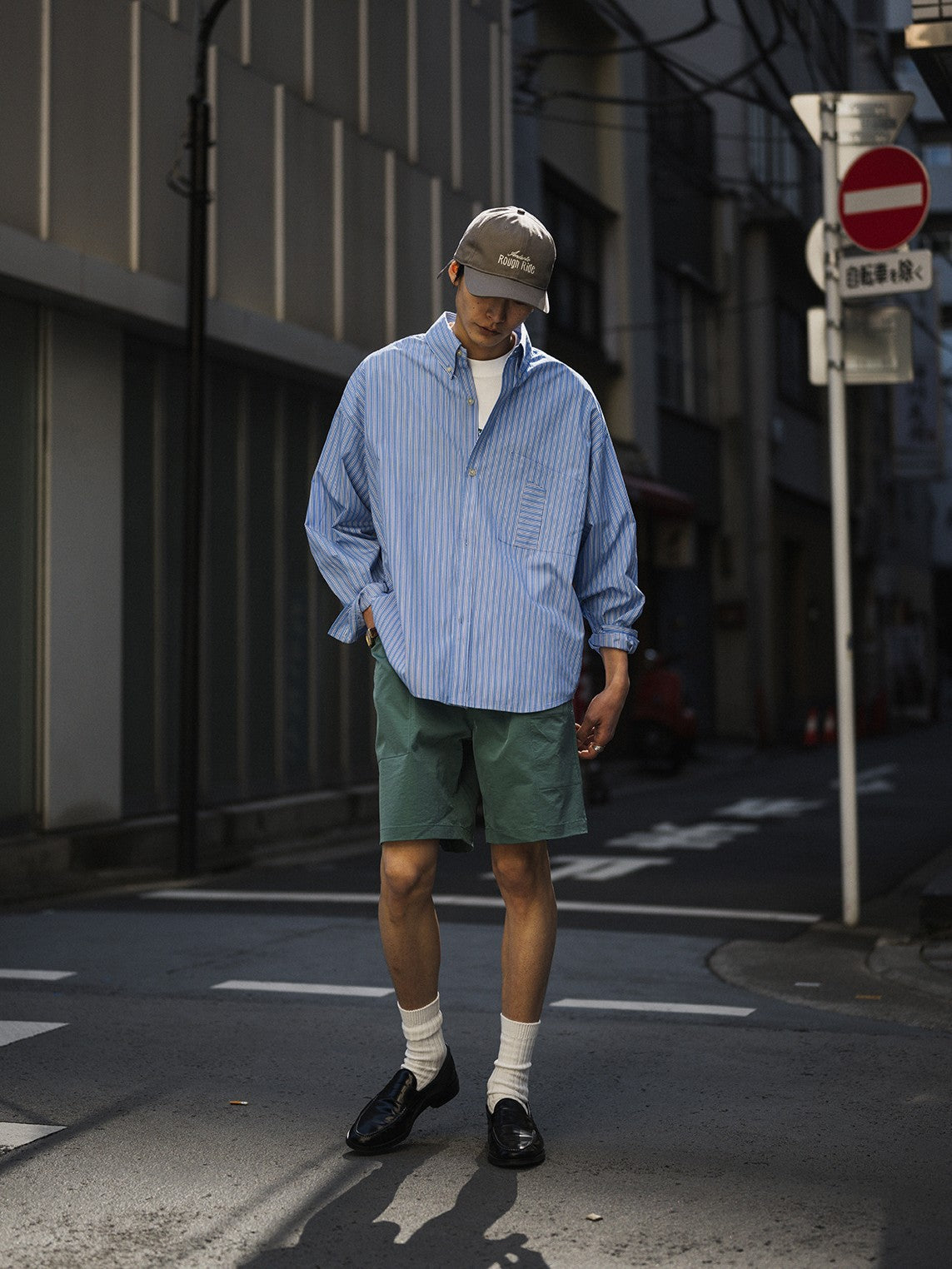 A Eckhaus Latta Shirt pictured on a model in front of a white background. The title of the product is Eckhaus Latta Eclipse Turtleneck - Stone and the image was taken by 199A®.