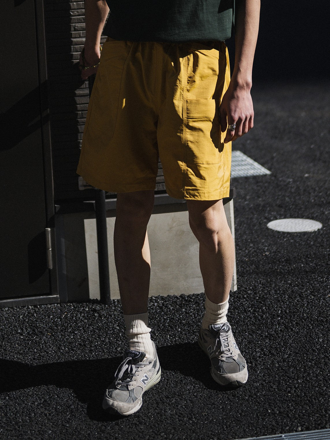 A Eckhaus Latta Shirt pictured on a model in front of a white background. The title of the product is Eckhaus Latta Eclipse Turtleneck - Stone and the image was taken by 199A®.