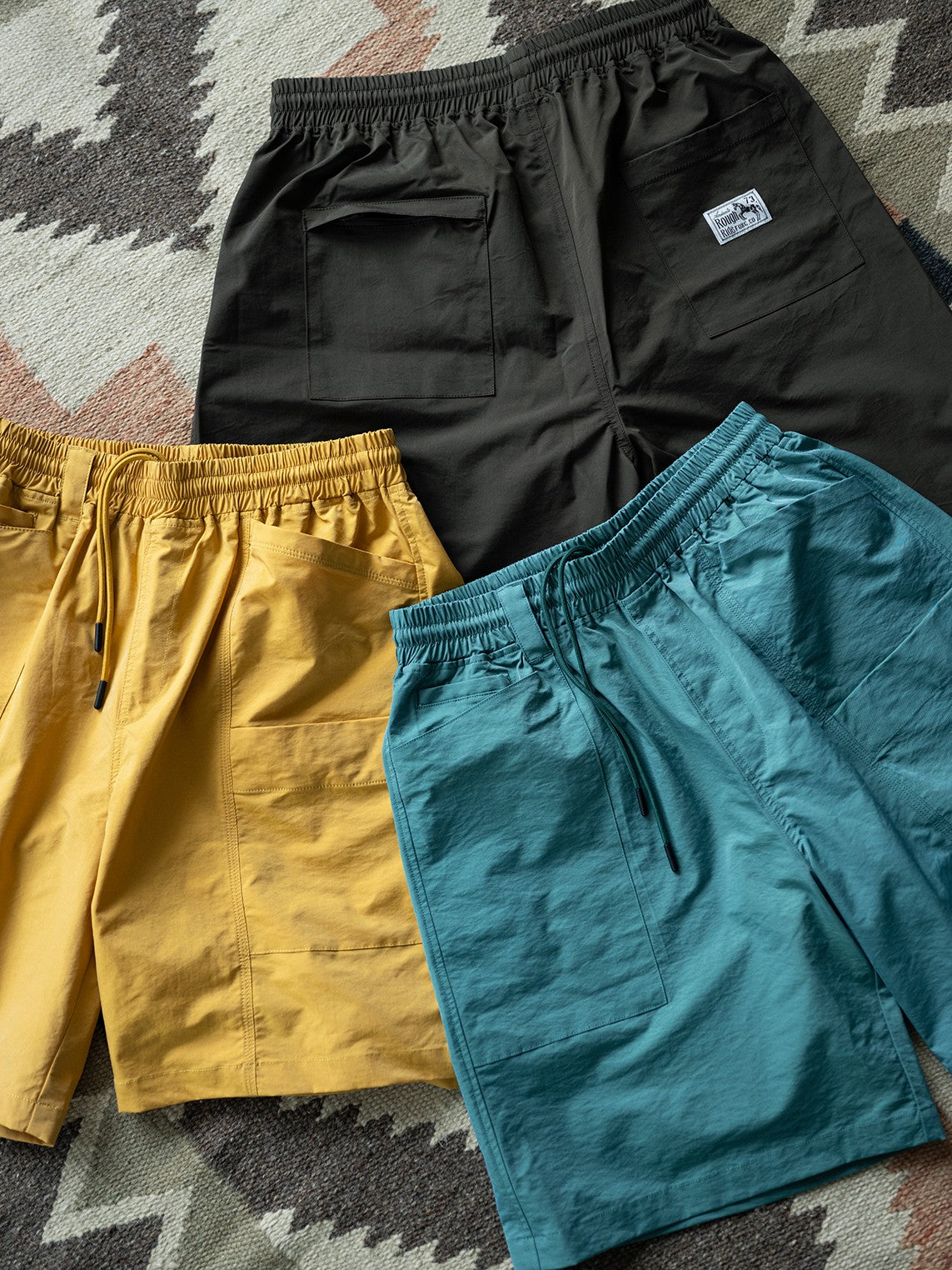 A Eckhaus Latta Shirt pictured on a model in front of a white background. The title of the product is Eckhaus Latta Eclipse Turtleneck - Stone and the image was taken by 199A®.