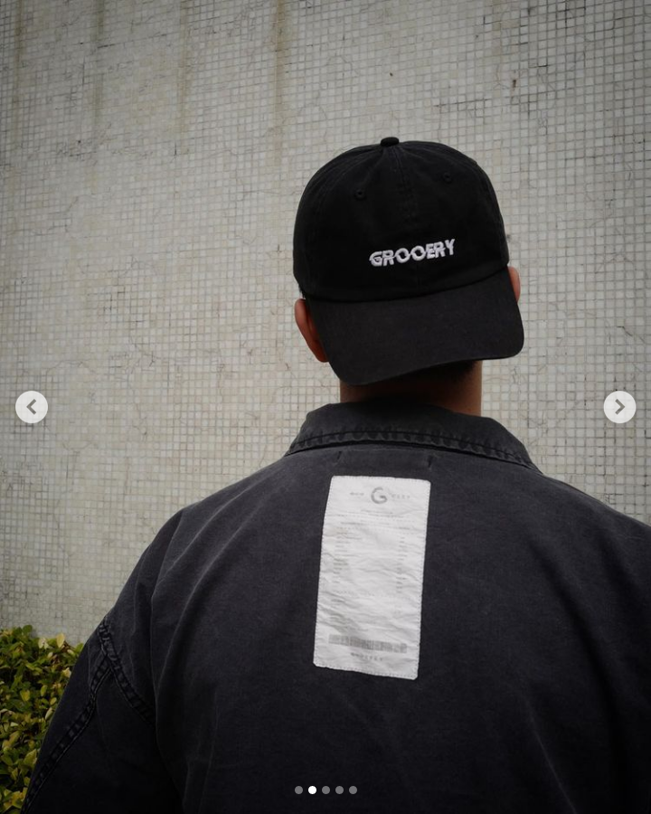 A Eckhaus Latta Shirt pictured on a model in front of a white background. The title of the product is Eckhaus Latta Eclipse Turtleneck - Stone and the image was taken by 199A®.