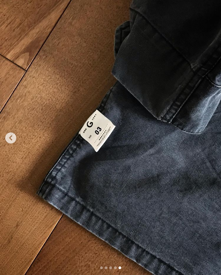 A Eckhaus Latta Shirt pictured on a model in front of a white background. The title of the product is Eckhaus Latta Eclipse Turtleneck - Stone and the image was taken by 199A®.