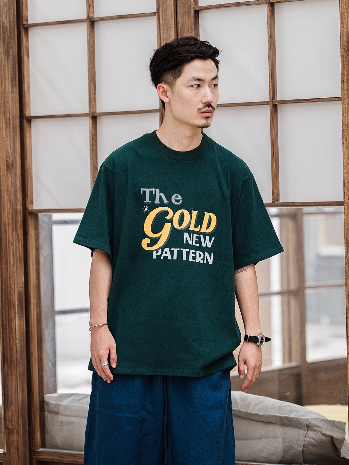 A Eckhaus Latta Shirt pictured on a model in front of a white background. The title of the product is Eckhaus Latta Eclipse Turtleneck - Stone and the image was taken by 199A®.