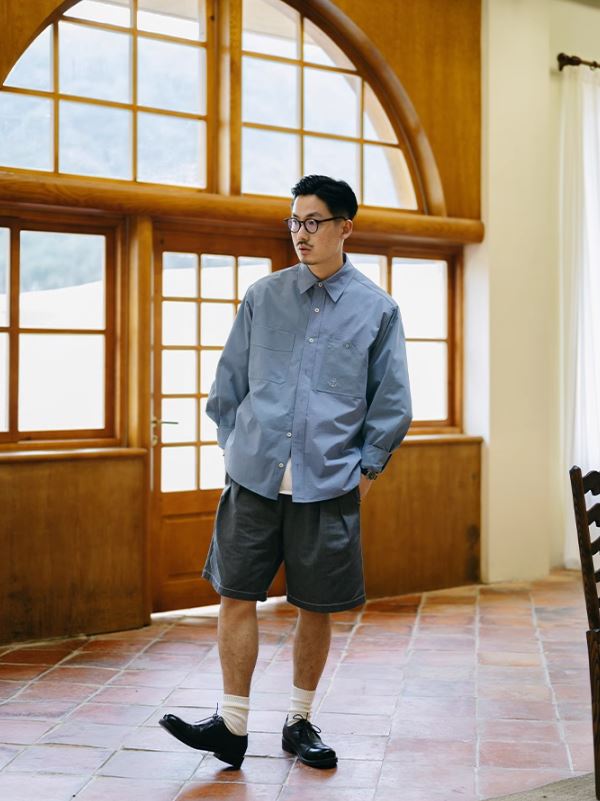 A Eckhaus Latta Shirt pictured on a model in front of a white background. The title of the product is Eckhaus Latta Eclipse Turtleneck - Stone and the image was taken by 199A®.