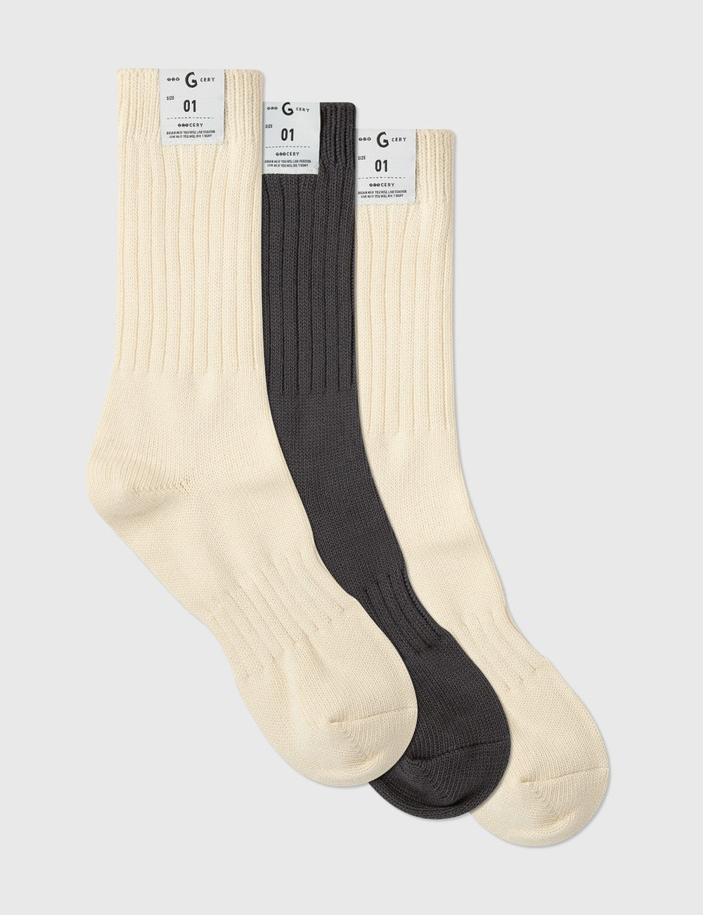 A Eckhaus Latta Shirt pictured on a model in front of a white background. The title of the product is Eckhaus Latta Eclipse Turtleneck - Stone and the image was taken by 199A®.