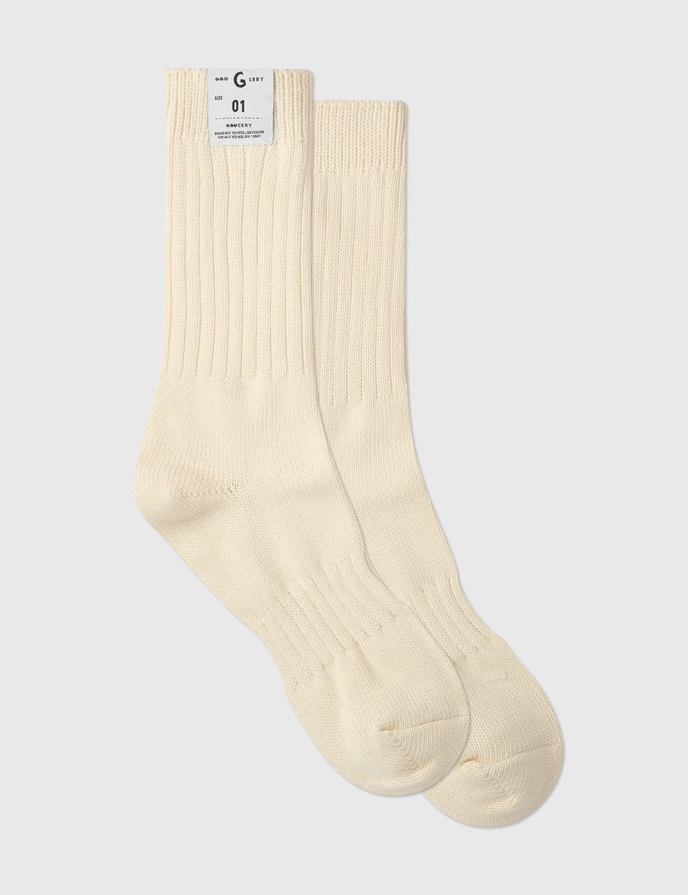 A Eckhaus Latta Shirt pictured on a model in front of a white background. The title of the product is Eckhaus Latta Eclipse Turtleneck - Stone and the image was taken by 199A®.