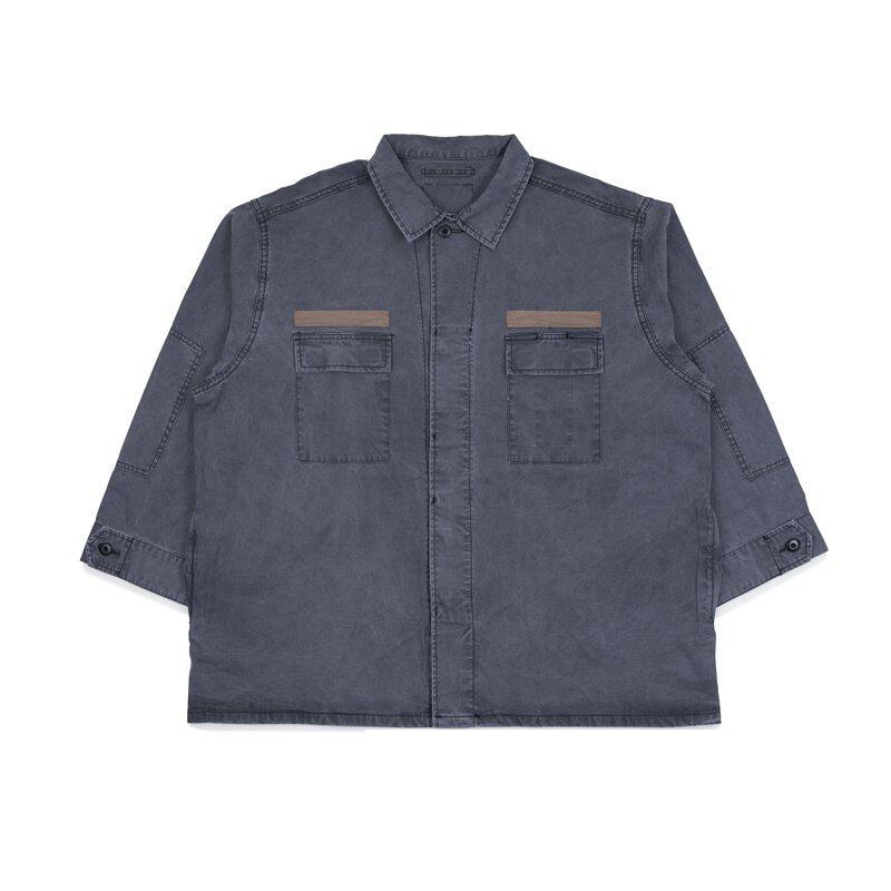 A Eckhaus Latta Shirt pictured on a model in front of a white background. The title of the product is Eckhaus Latta Eclipse Turtleneck - Stone and the image was taken by 199A®.