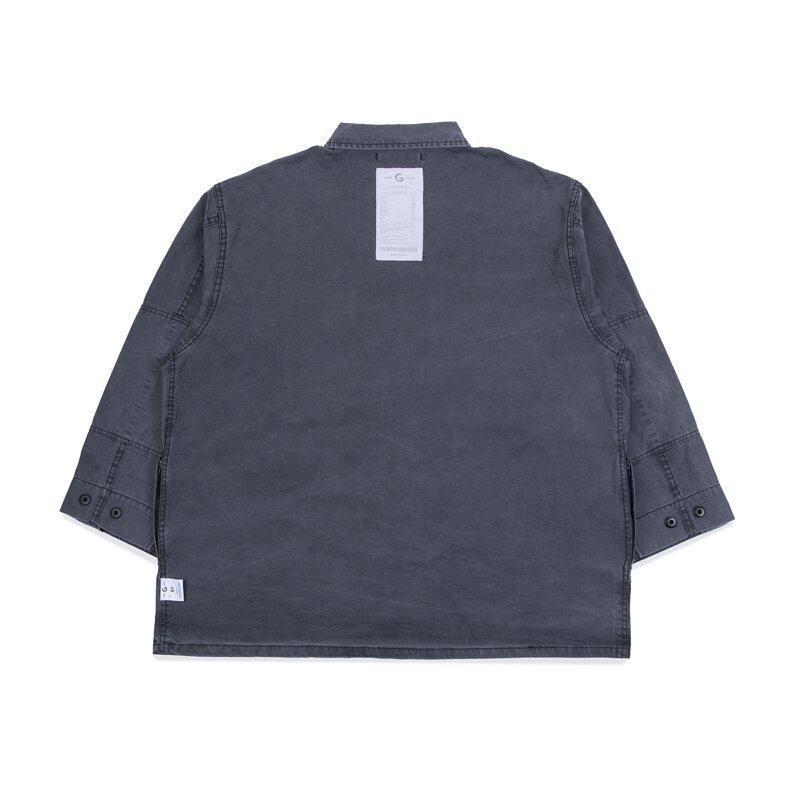 A Eckhaus Latta Shirt pictured on a model in front of a white background. The title of the product is Eckhaus Latta Eclipse Turtleneck - Stone and the image was taken by 199A®.