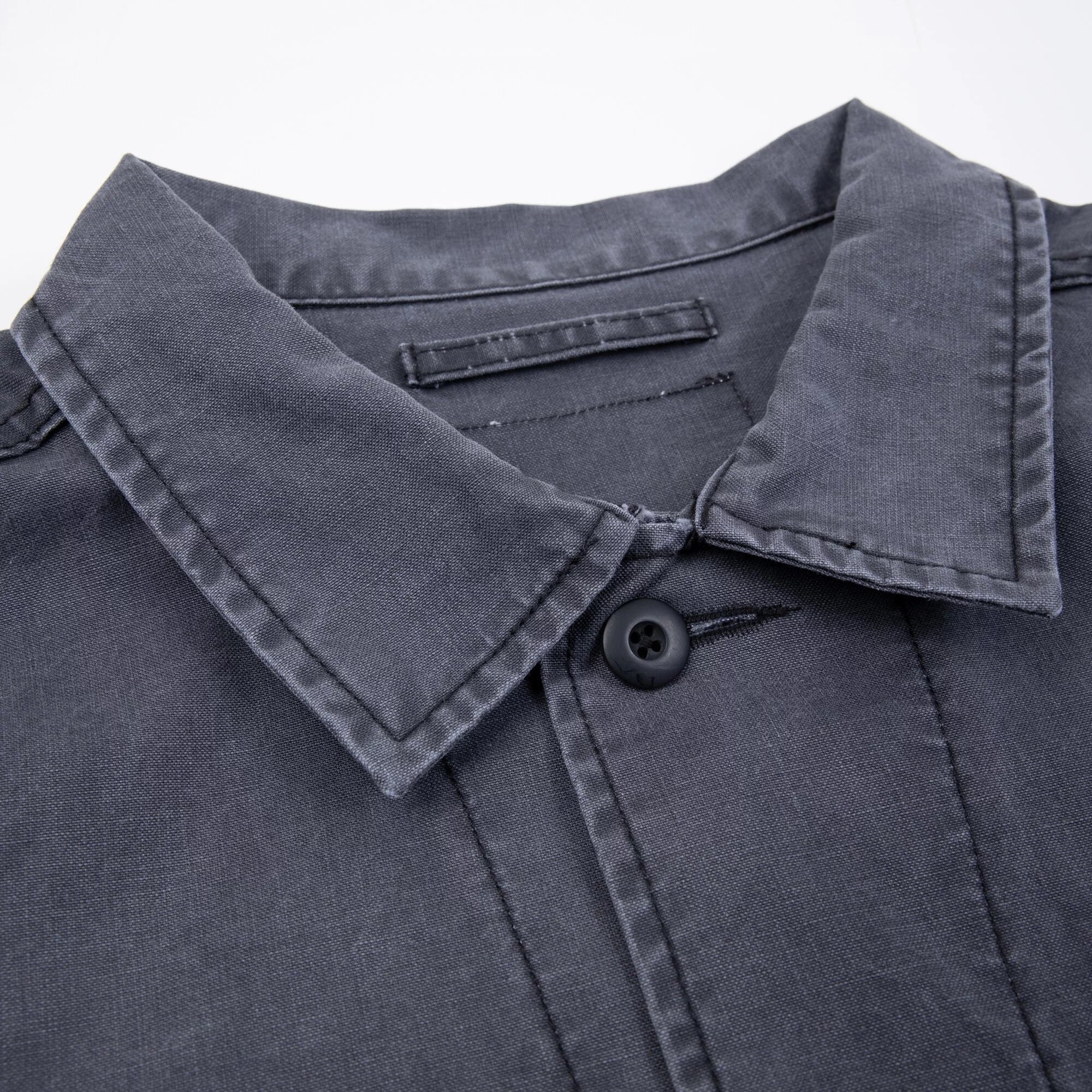 A Eckhaus Latta Shirt pictured on a model in front of a white background. The title of the product is Eckhaus Latta Eclipse Turtleneck - Stone and the image was taken by 199A®.