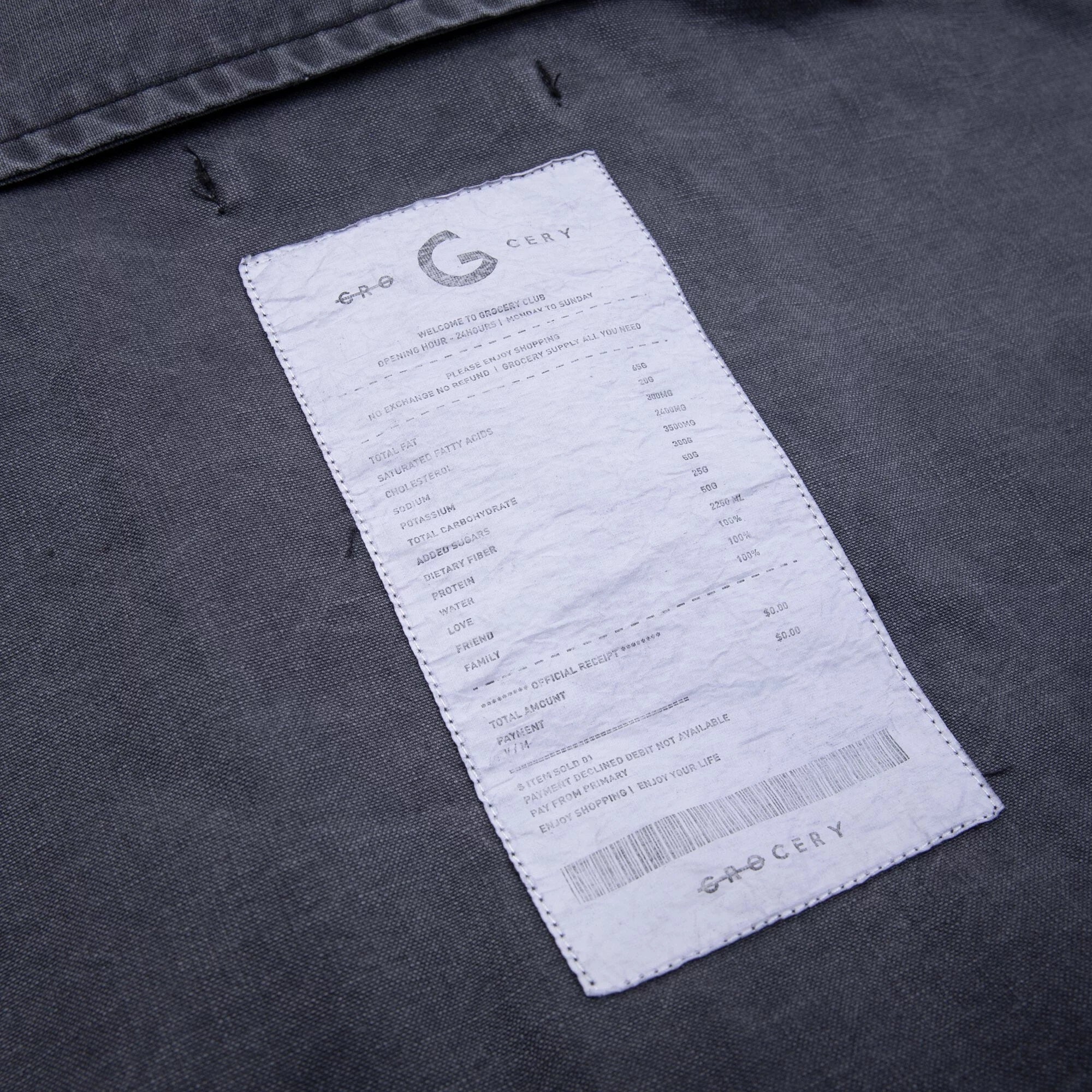 A Eckhaus Latta Shirt pictured on a model in front of a white background. The title of the product is Eckhaus Latta Eclipse Turtleneck - Stone and the image was taken by 199A®.