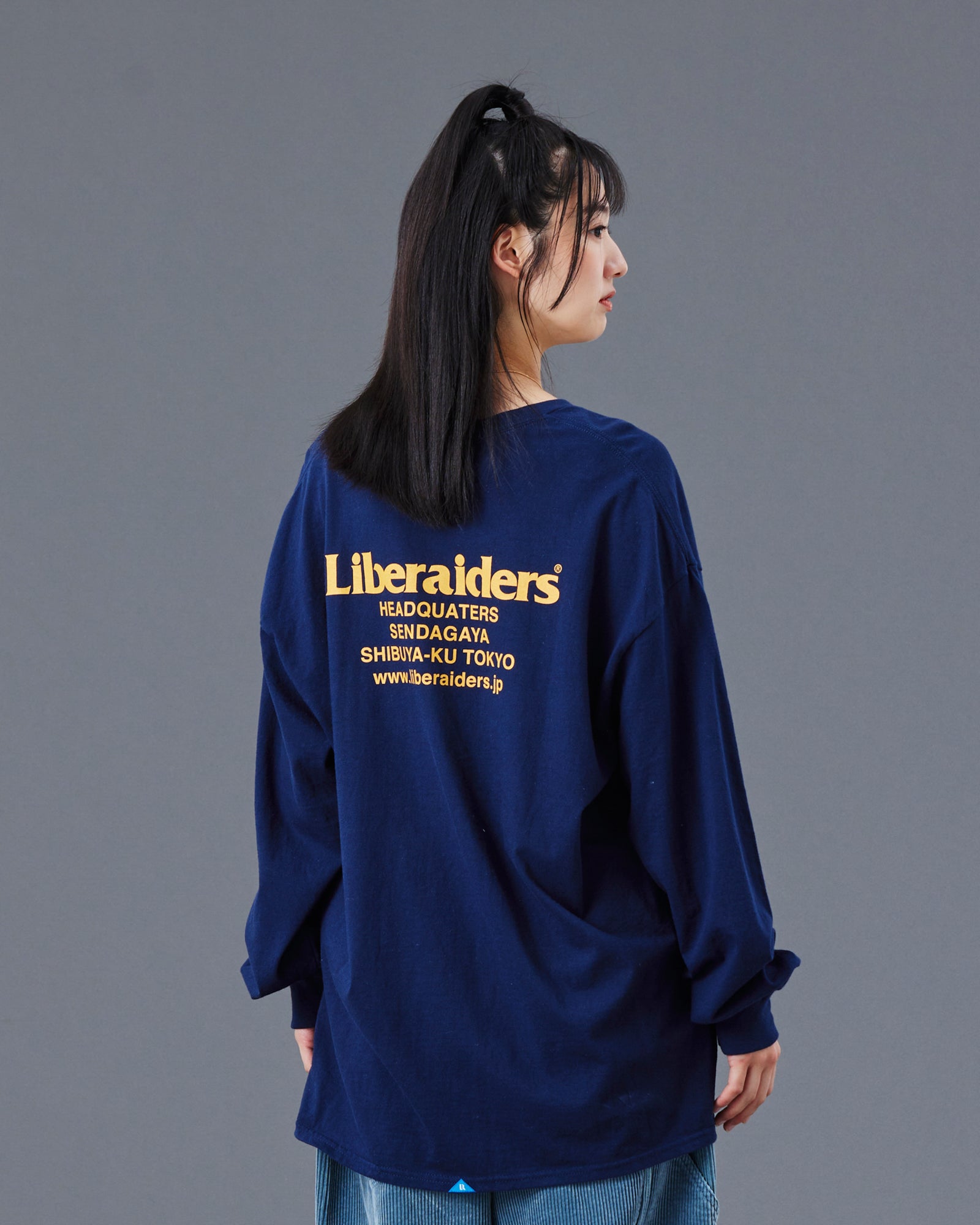 A Eckhaus Latta Shirt pictured on a model in front of a white background. The title of the product is Eckhaus Latta Eclipse Turtleneck - Stone and the image was taken by 199A®.