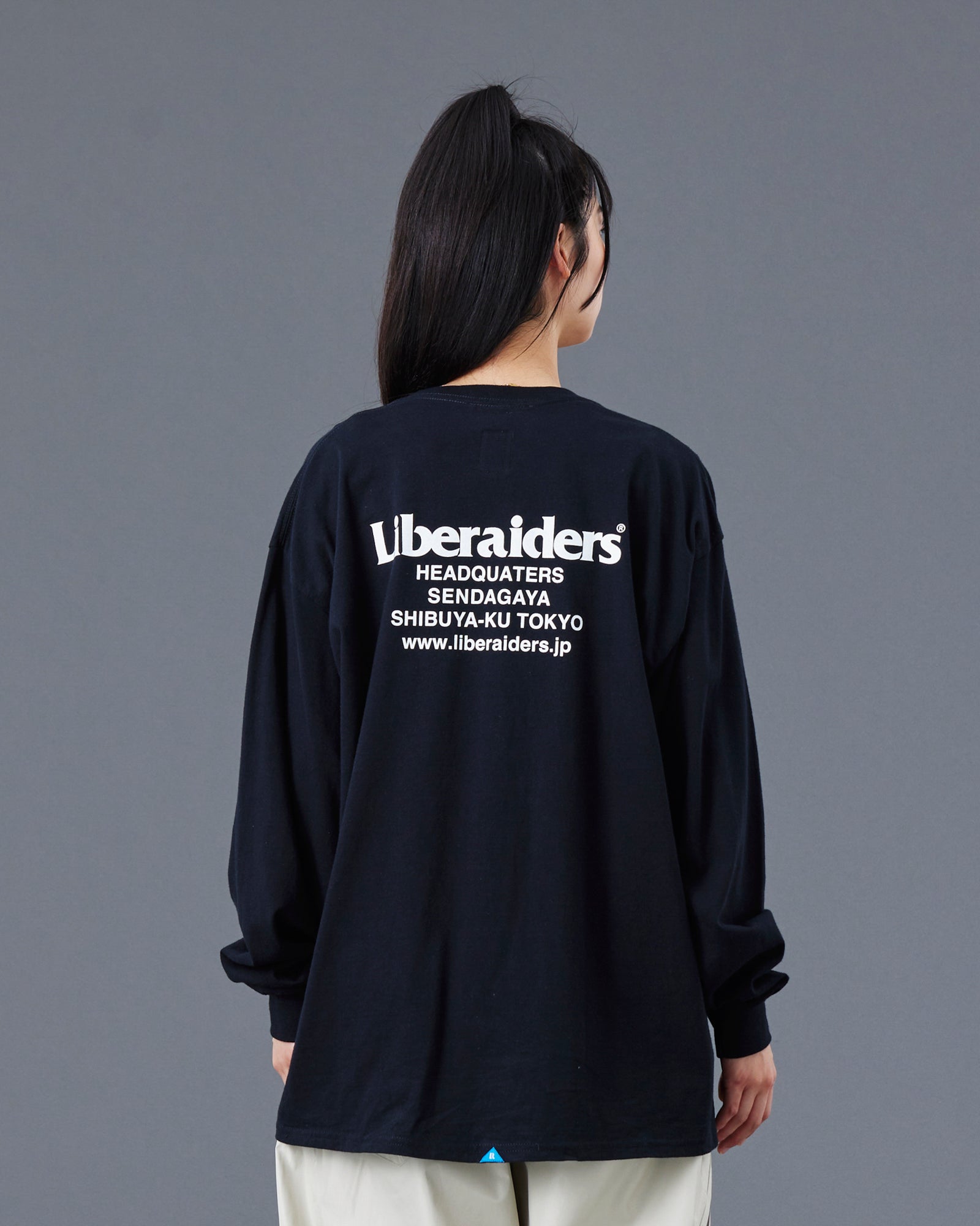 A Eckhaus Latta Shirt pictured on a model in front of a white background. The title of the product is Eckhaus Latta Eclipse Turtleneck - Stone and the image was taken by 199A®.