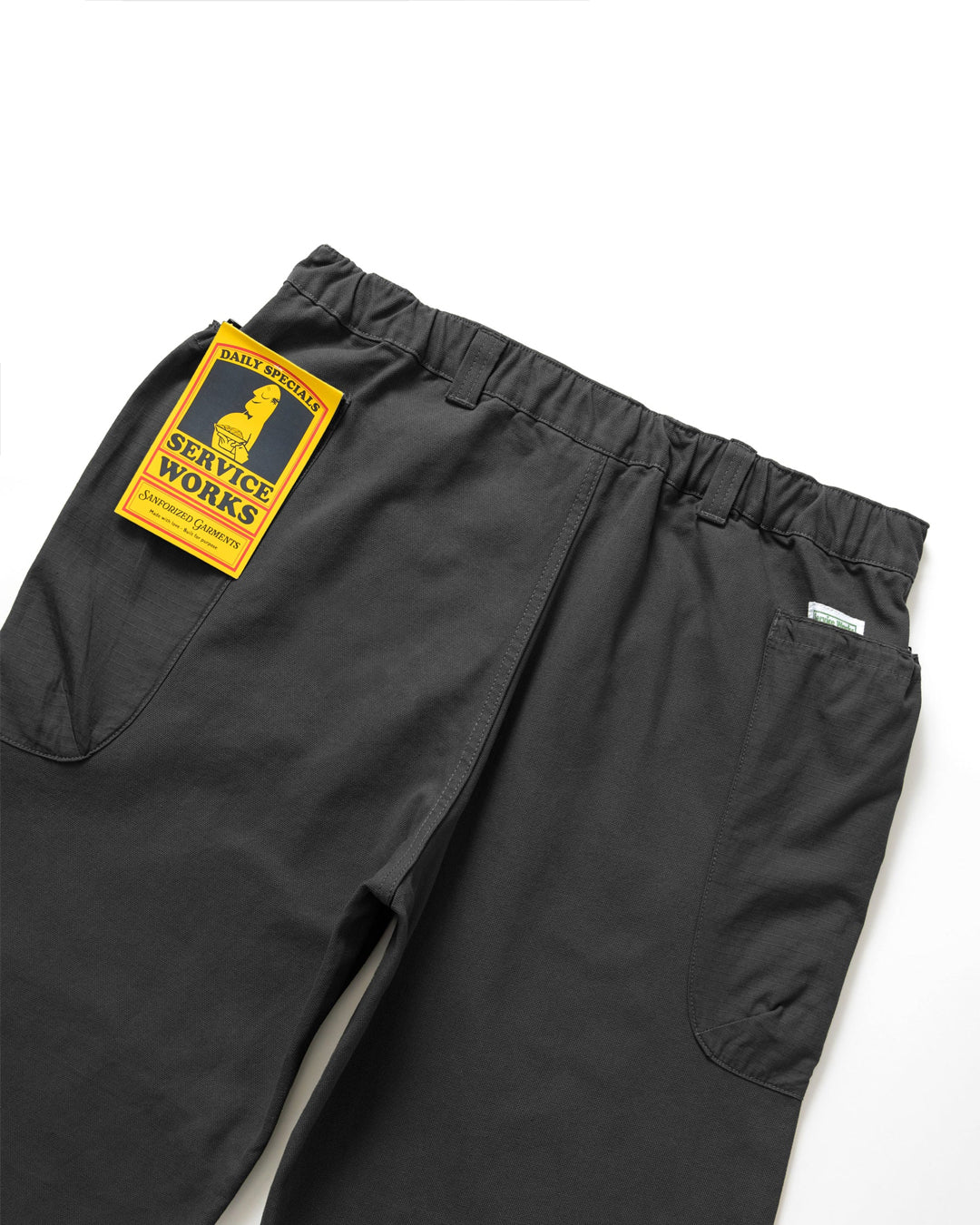 A Eckhaus Latta Shirt pictured on a model in front of a white background. The title of the product is Eckhaus Latta Eclipse Turtleneck - Stone and the image was taken by 199A®.