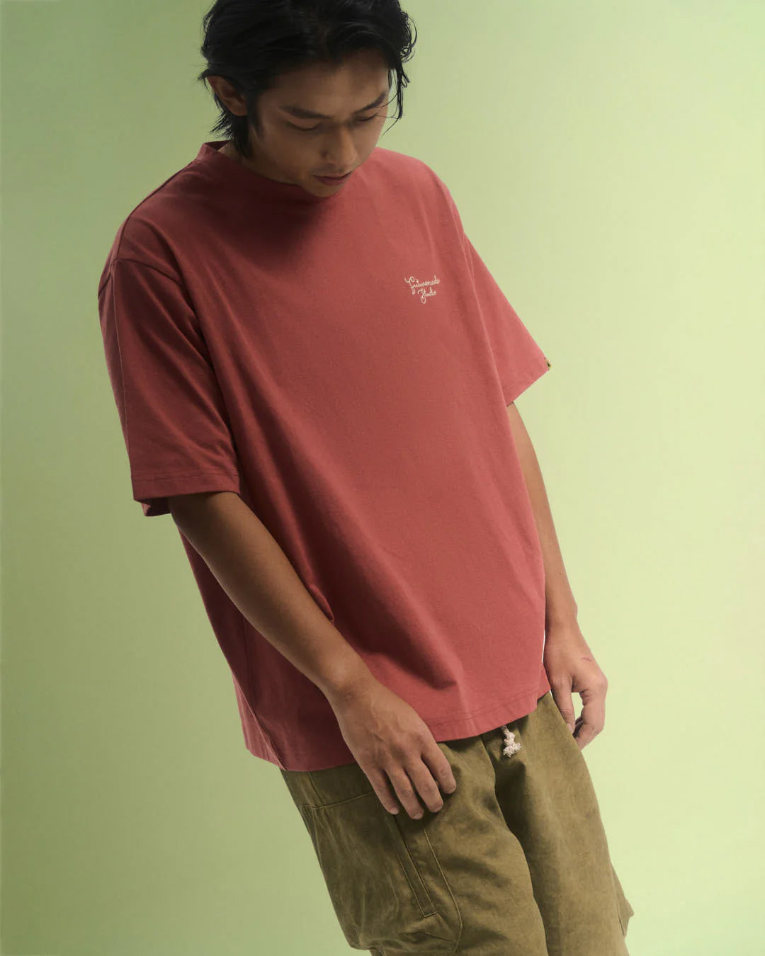 A Eckhaus Latta Shirt pictured on a model in front of a white background. The title of the product is Eckhaus Latta Eclipse Turtleneck - Stone and the image was taken by 199A®.