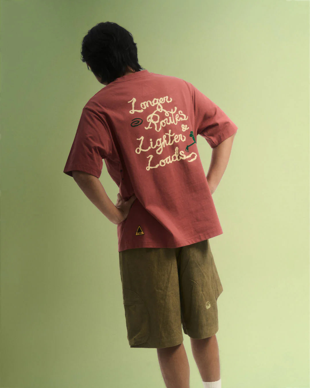 A Eckhaus Latta Shirt pictured on a model in front of a white background. The title of the product is Eckhaus Latta Eclipse Turtleneck - Stone and the image was taken by 199A®.