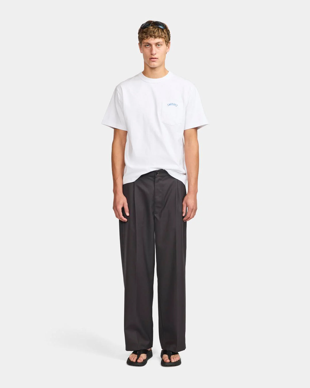 A Eckhaus Latta Shirt pictured on a model in front of a white background. The title of the product is Eckhaus Latta Eclipse Turtleneck - Stone and the image was taken by 199A®.
