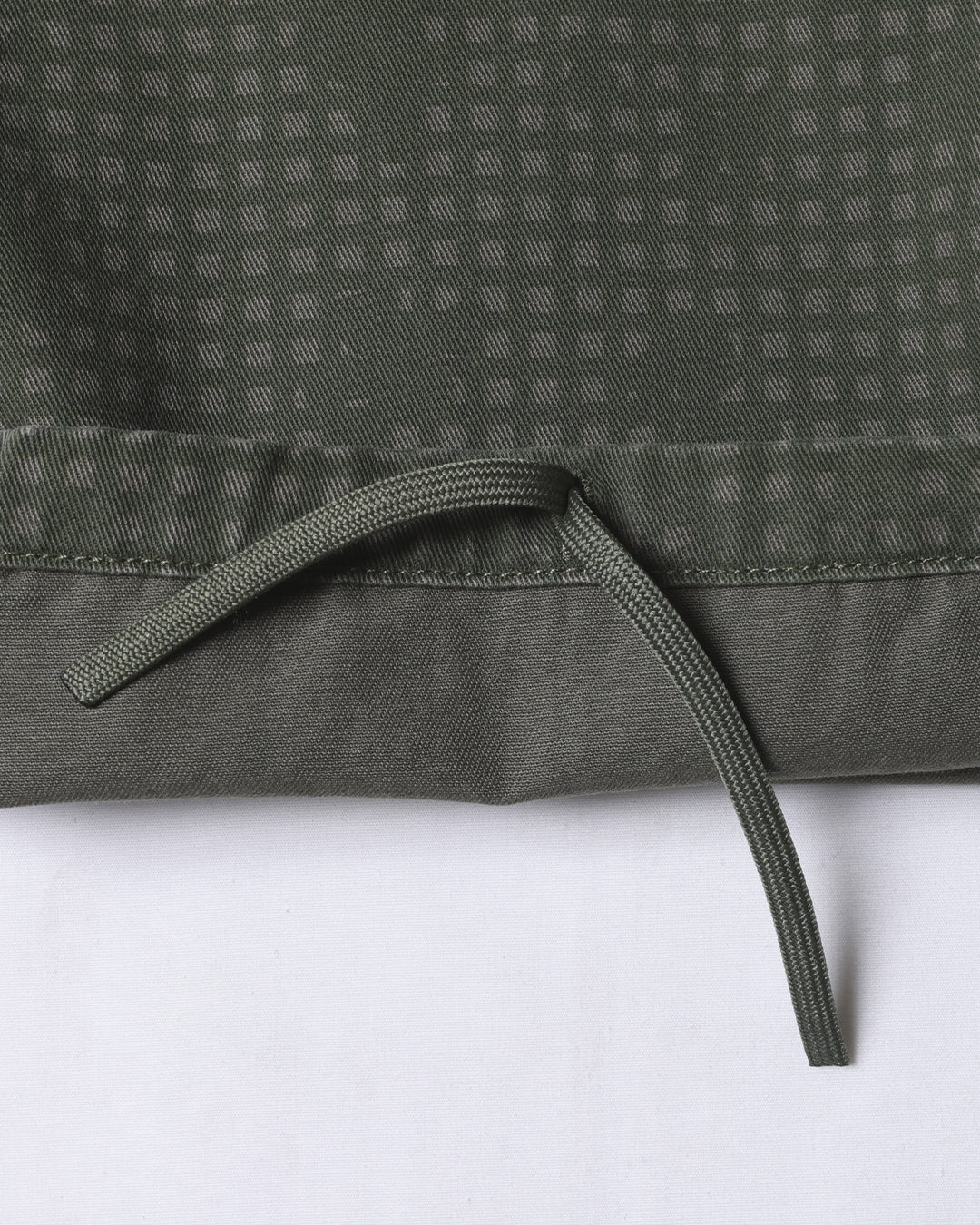 A Eckhaus Latta Shirt pictured on a model in front of a white background. The title of the product is Eckhaus Latta Eclipse Turtleneck - Stone and the image was taken by 199A®.