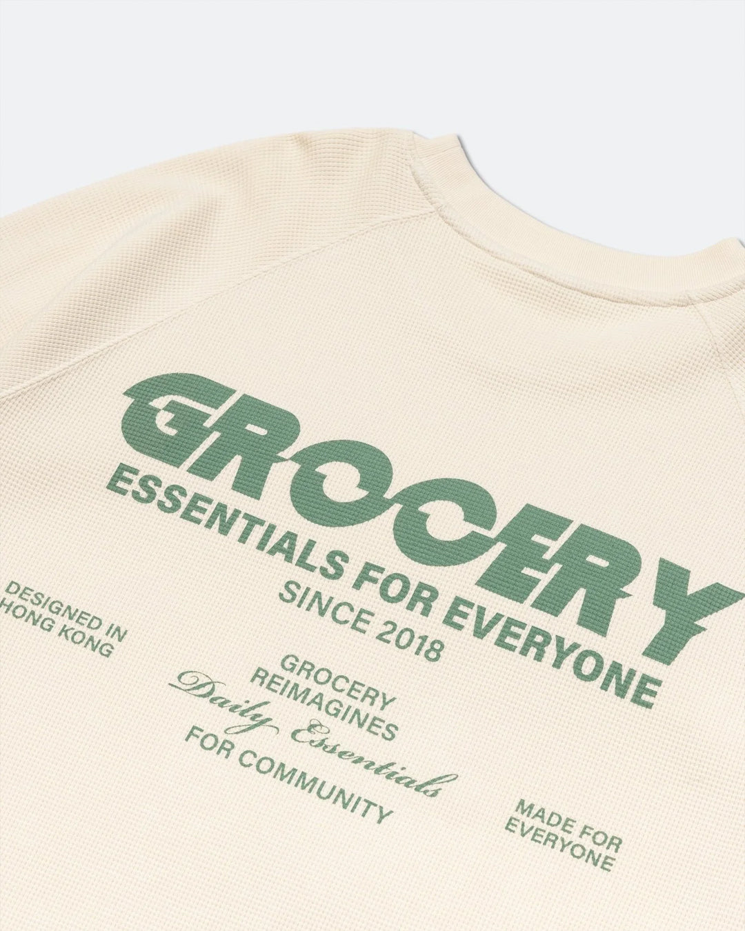 A Eckhaus Latta Shirt pictured on a model in front of a white background. The title of the product is Eckhaus Latta Eclipse Turtleneck - Stone and the image was taken by 199A®.