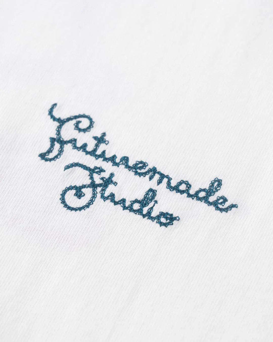 A Eckhaus Latta Shirt pictured on a model in front of a white background. The title of the product is Eckhaus Latta Eclipse Turtleneck - Stone and the image was taken by 199A®.