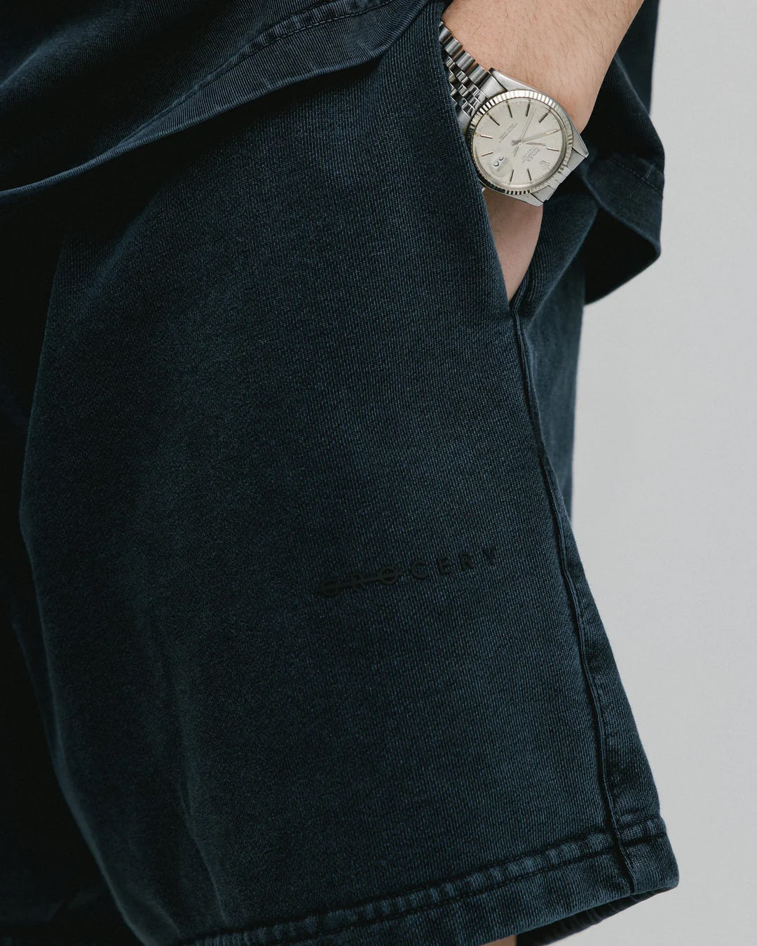 A Eckhaus Latta Shirt pictured on a model in front of a white background. The title of the product is Eckhaus Latta Eclipse Turtleneck - Stone and the image was taken by 199A®.