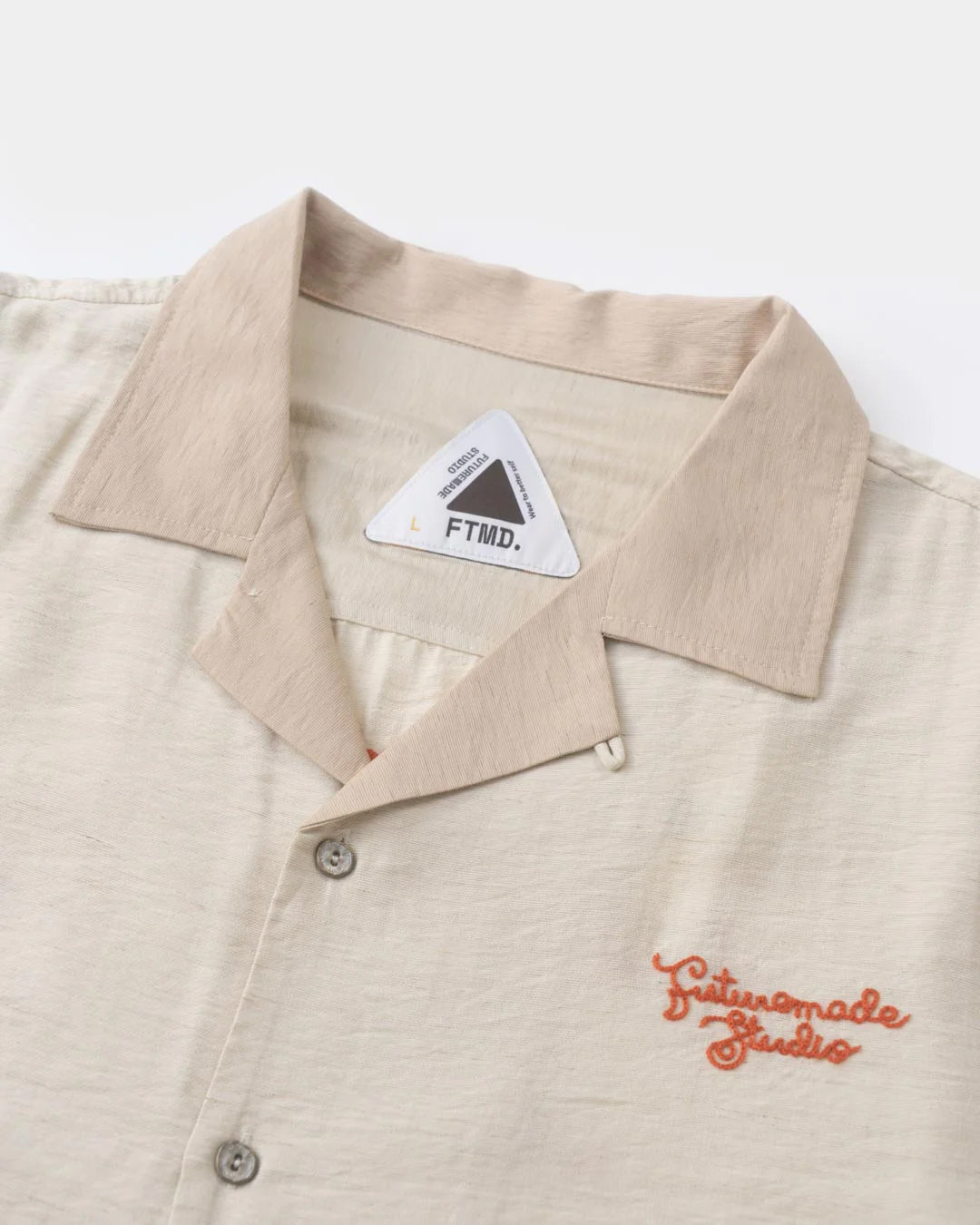 A Eckhaus Latta Shirt pictured on a model in front of a white background. The title of the product is Eckhaus Latta Eclipse Turtleneck - Stone and the image was taken by 199A®.