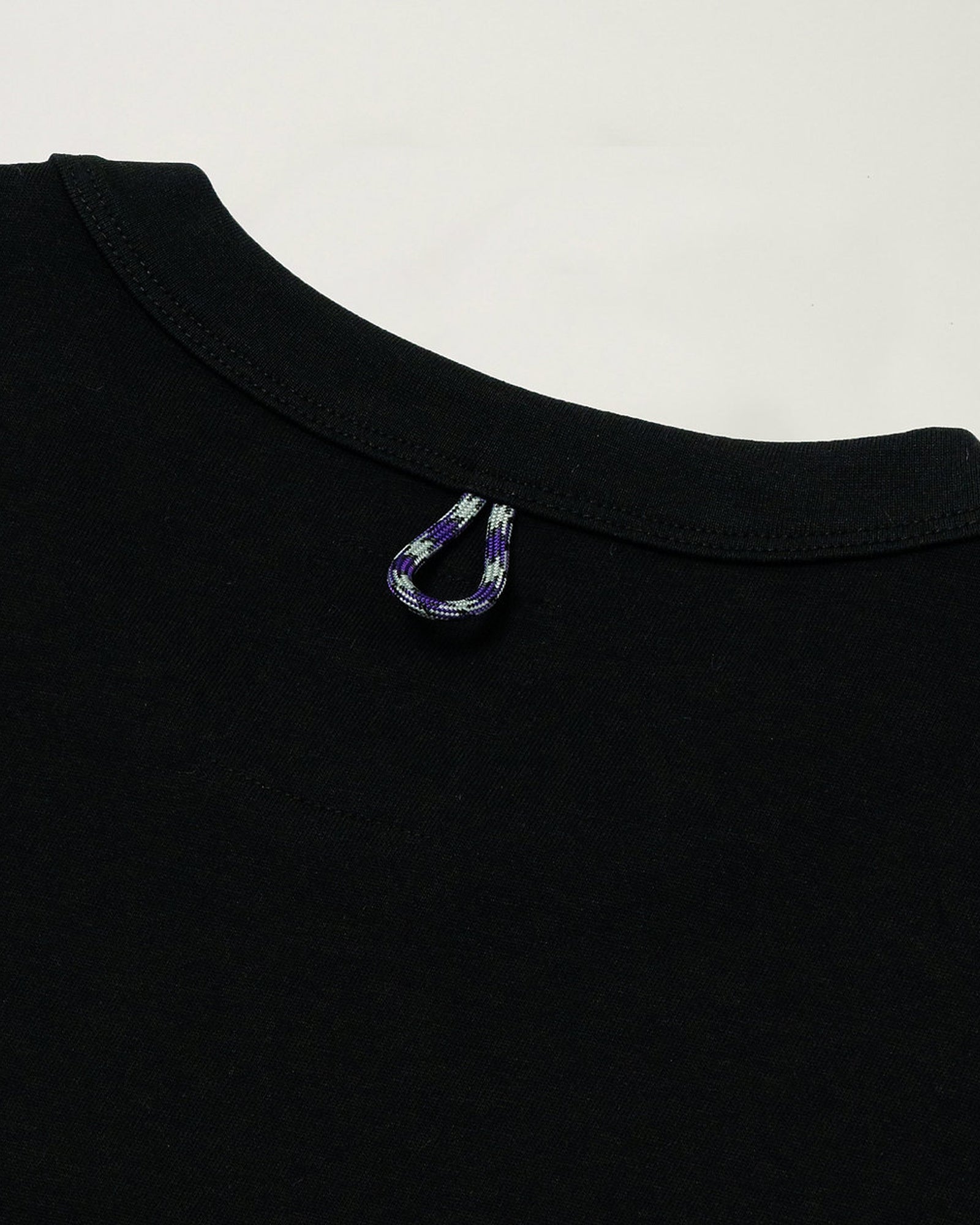 A Eckhaus Latta Shirt pictured on a model in front of a white background. The title of the product is Eckhaus Latta Eclipse Turtleneck - Stone and the image was taken by 199A®.