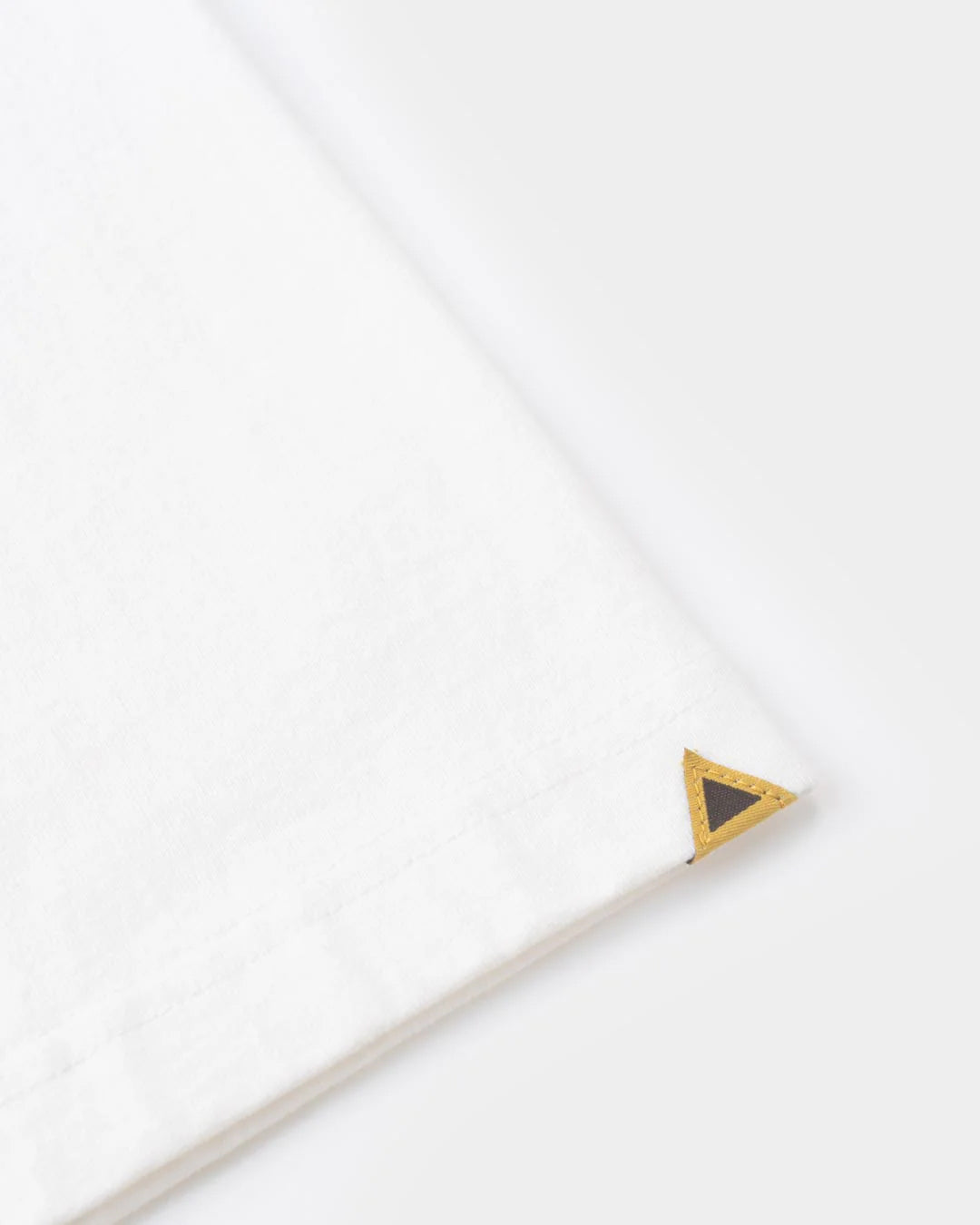 A Eckhaus Latta Shirt pictured on a model in front of a white background. The title of the product is Eckhaus Latta Eclipse Turtleneck - Stone and the image was taken by 199A®.