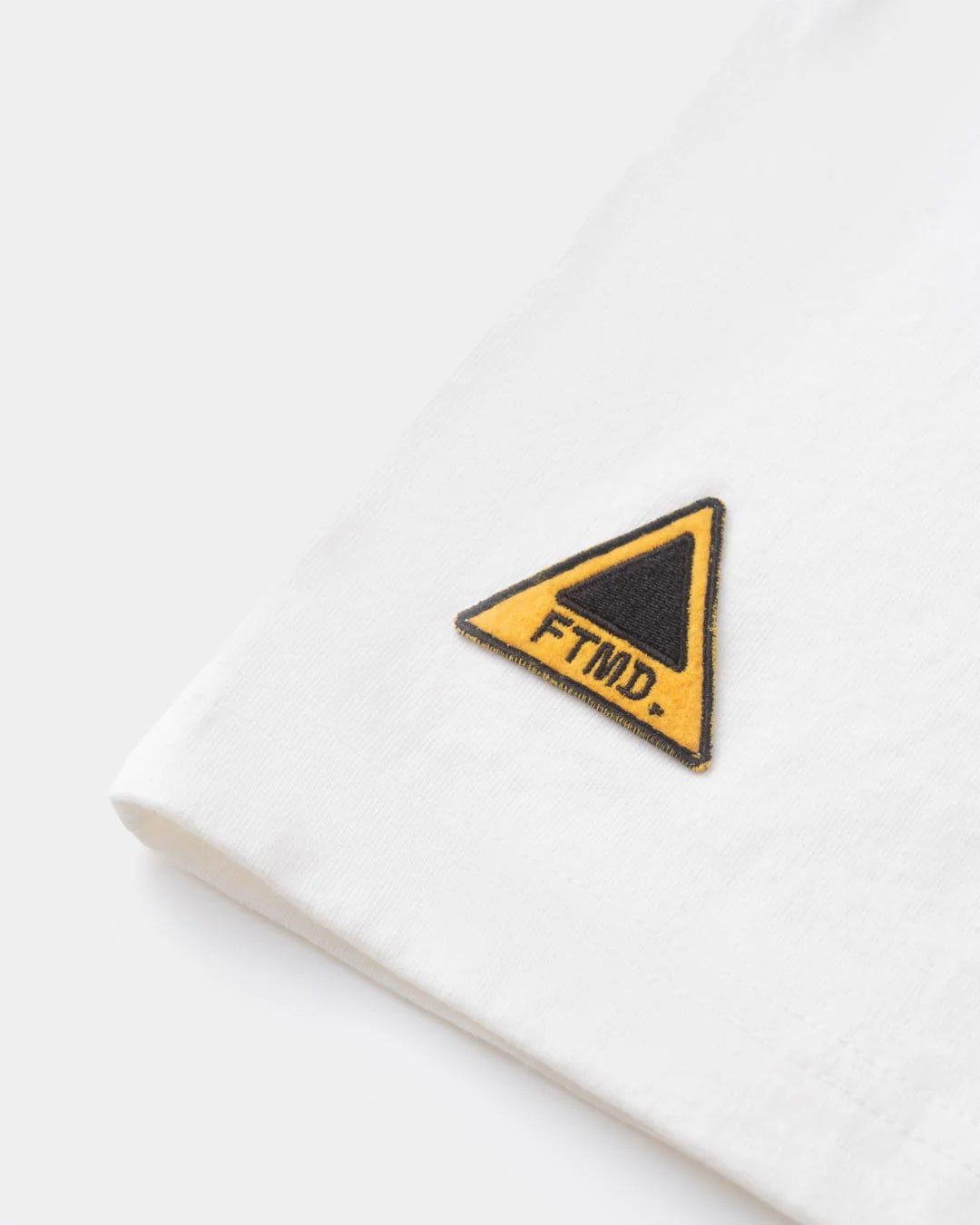 A Eckhaus Latta Shirt pictured on a model in front of a white background. The title of the product is Eckhaus Latta Eclipse Turtleneck - Stone and the image was taken by 199A®.