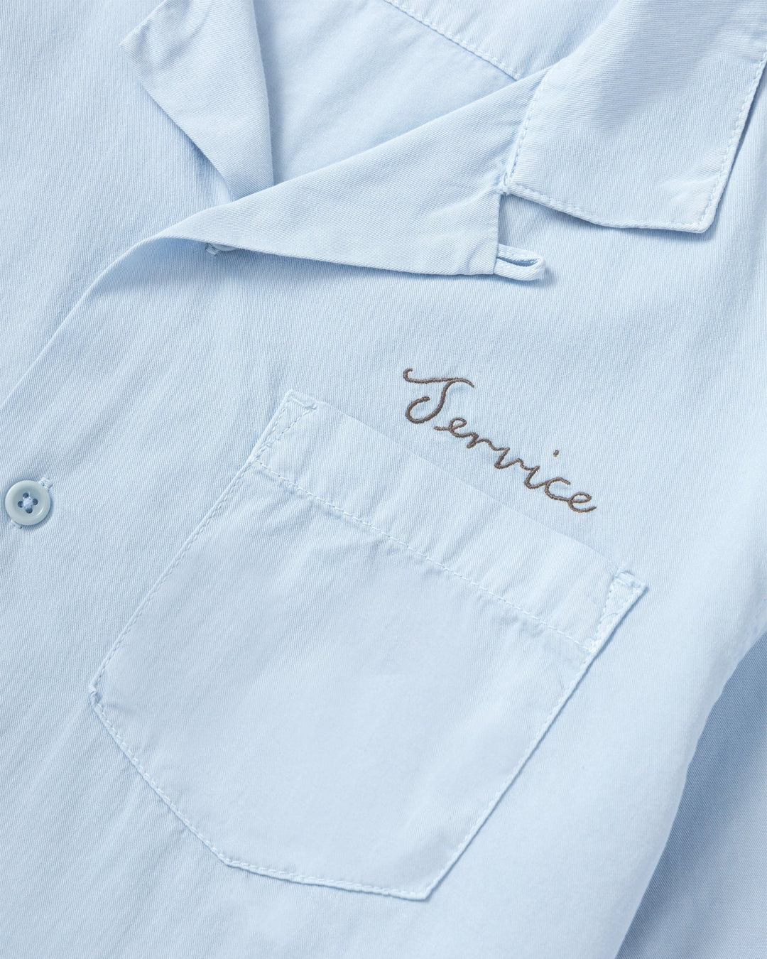 A Eckhaus Latta Shirt pictured on a model in front of a white background. The title of the product is Eckhaus Latta Eclipse Turtleneck - Stone and the image was taken by 199A®.