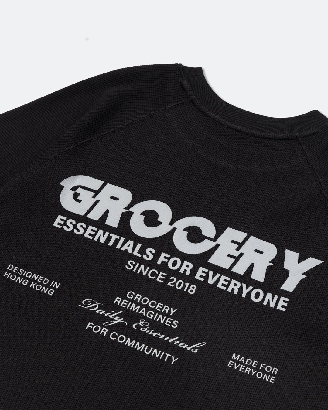 A Eckhaus Latta Shirt pictured on a model in front of a white background. The title of the product is Eckhaus Latta Eclipse Turtleneck - Stone and the image was taken by 199A®.