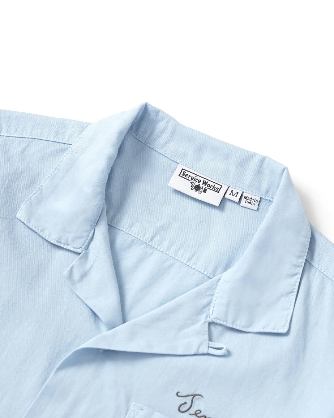 A Eckhaus Latta Shirt pictured on a model in front of a white background. The title of the product is Eckhaus Latta Eclipse Turtleneck - Stone and the image was taken by 199A®.