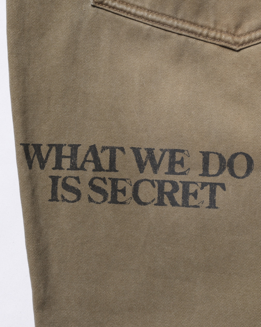 A Eckhaus Latta Shirt pictured on a model in front of a white background. The title of the product is Eckhaus Latta Eclipse Turtleneck - Stone and the image was taken by 199A®.