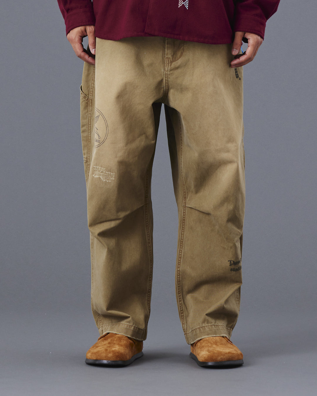 A Eckhaus Latta Shirt pictured on a model in front of a white background. The title of the product is Eckhaus Latta Eclipse Turtleneck - Stone and the image was taken by 199A®.