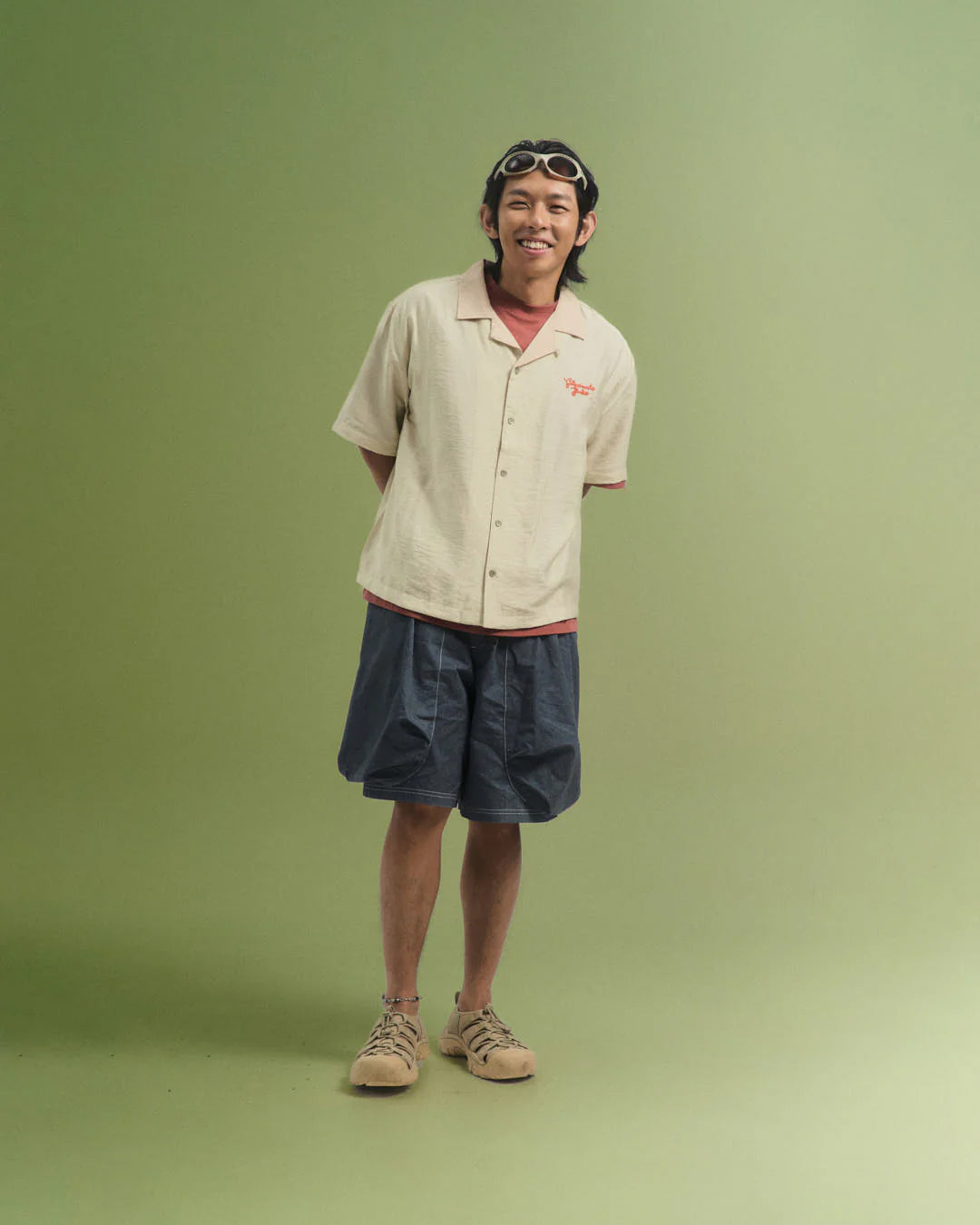 A Eckhaus Latta Shirt pictured on a model in front of a white background. The title of the product is Eckhaus Latta Eclipse Turtleneck - Stone and the image was taken by 199A®.