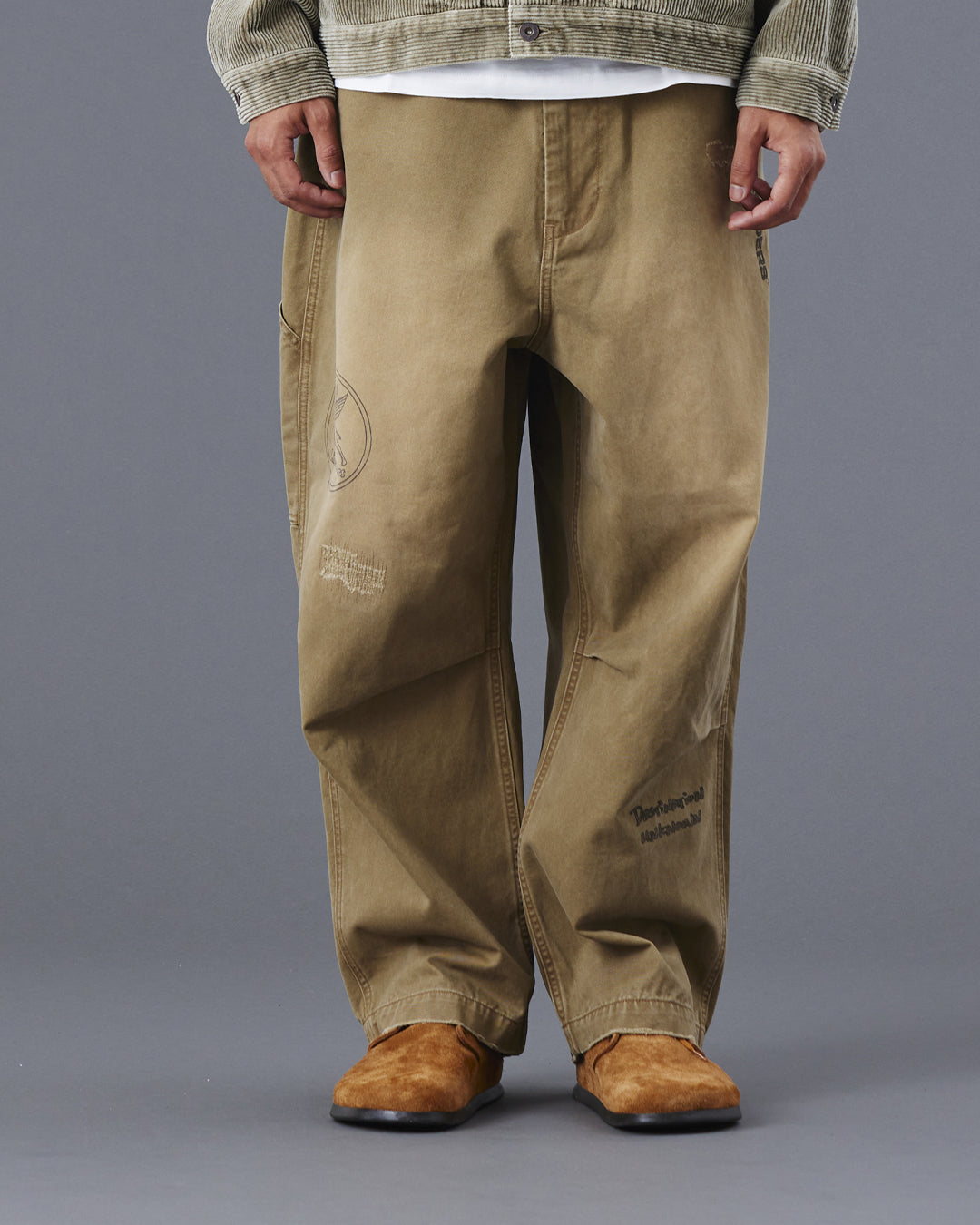 A Eckhaus Latta Shirt pictured on a model in front of a white background. The title of the product is Eckhaus Latta Eclipse Turtleneck - Stone and the image was taken by 199A®.