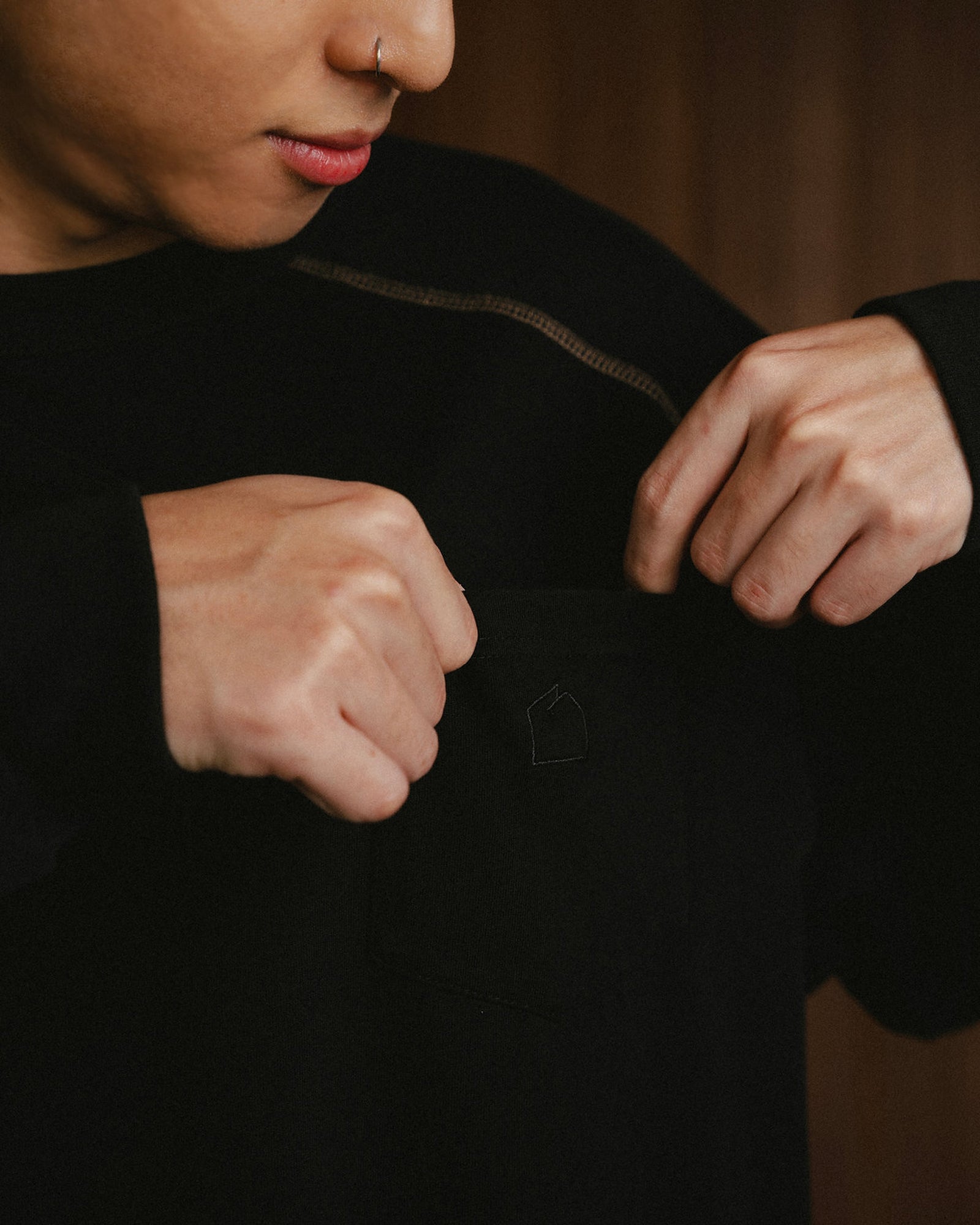 A Eckhaus Latta Shirt pictured on a model in front of a white background. The title of the product is Eckhaus Latta Eclipse Turtleneck - Stone and the image was taken by 199A®.