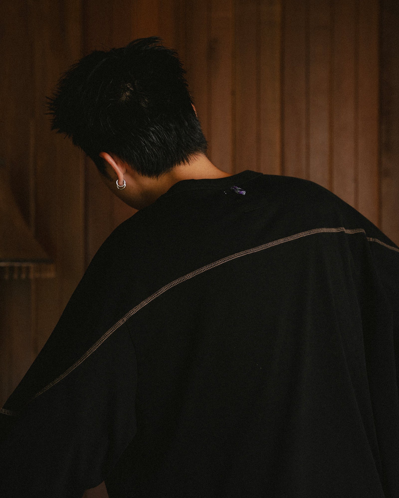 A Eckhaus Latta Shirt pictured on a model in front of a white background. The title of the product is Eckhaus Latta Eclipse Turtleneck - Stone and the image was taken by 199A®.