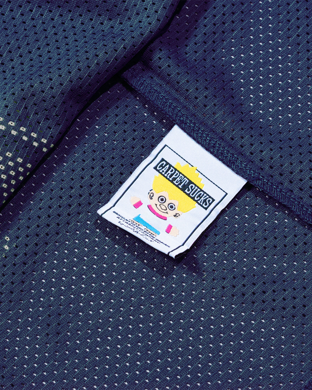 A Eckhaus Latta Shirt pictured on a model in front of a white background. The title of the product is Eckhaus Latta Eclipse Turtleneck - Stone and the image was taken by 199A®.