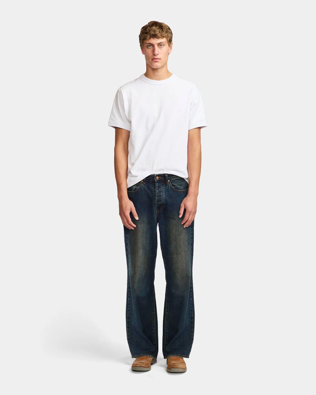 A Eckhaus Latta Shirt pictured on a model in front of a white background. The title of the product is Eckhaus Latta Eclipse Turtleneck - Stone and the image was taken by 199A®.