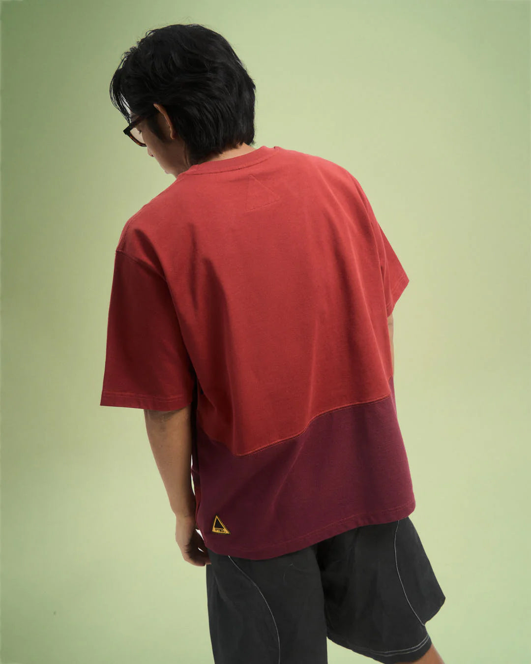 A Eckhaus Latta Shirt pictured on a model in front of a white background. The title of the product is Eckhaus Latta Eclipse Turtleneck - Stone and the image was taken by 199A®.