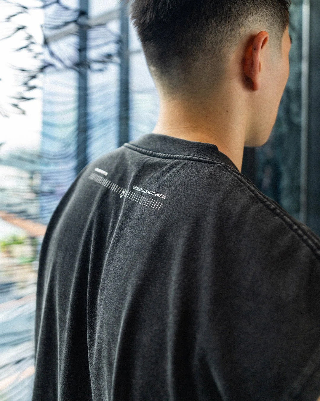 A Eckhaus Latta Shirt pictured on a model in front of a white background. The title of the product is Eckhaus Latta Eclipse Turtleneck - Stone and the image was taken by 199A®.