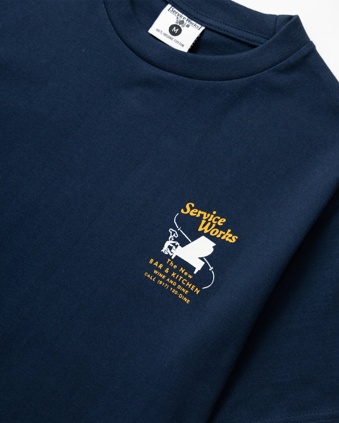 A Eckhaus Latta Shirt pictured on a model in front of a white background. The title of the product is Eckhaus Latta Eclipse Turtleneck - Stone and the image was taken by 199A®.