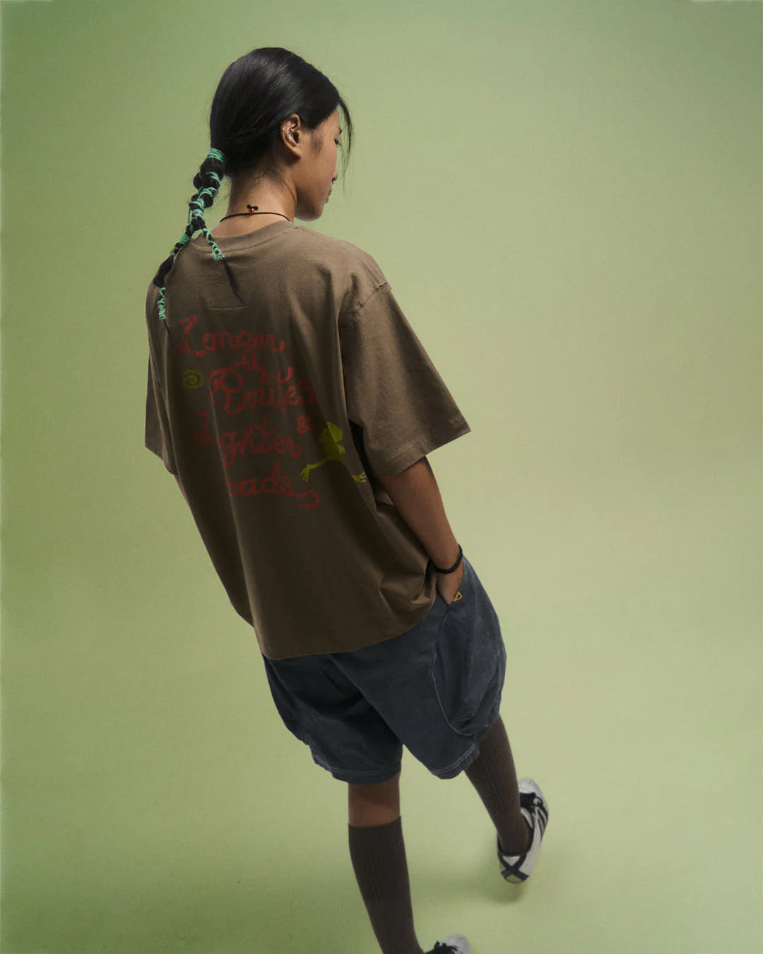 A Eckhaus Latta Shirt pictured on a model in front of a white background. The title of the product is Eckhaus Latta Eclipse Turtleneck - Stone and the image was taken by 199A®.