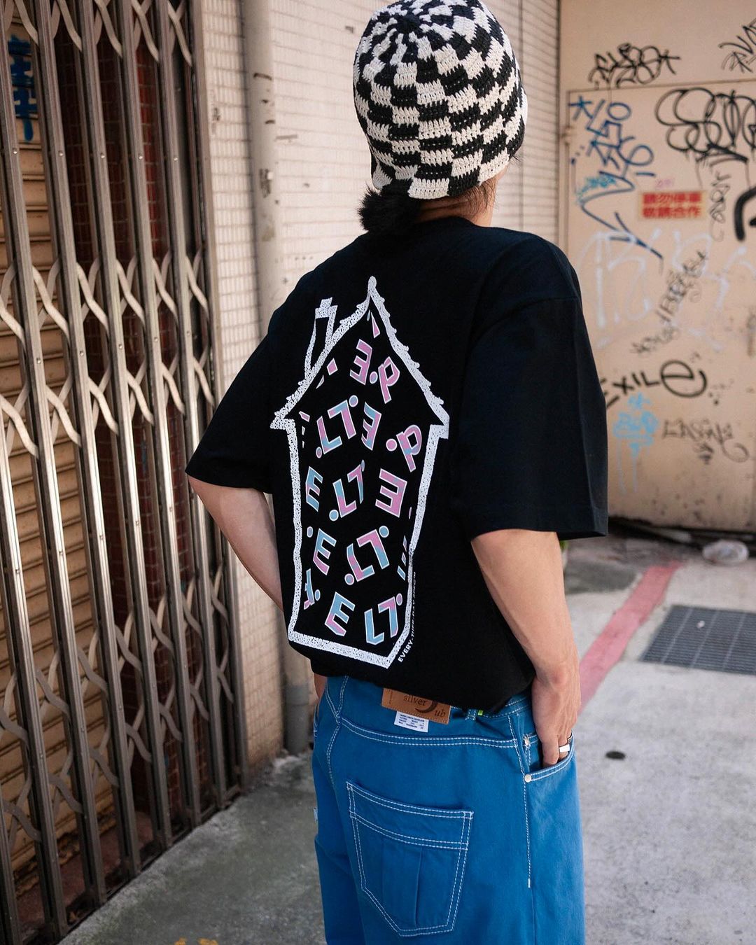 A Eckhaus Latta Shirt pictured on a model in front of a white background. The title of the product is Eckhaus Latta Eclipse Turtleneck - Stone and the image was taken by 199A®.