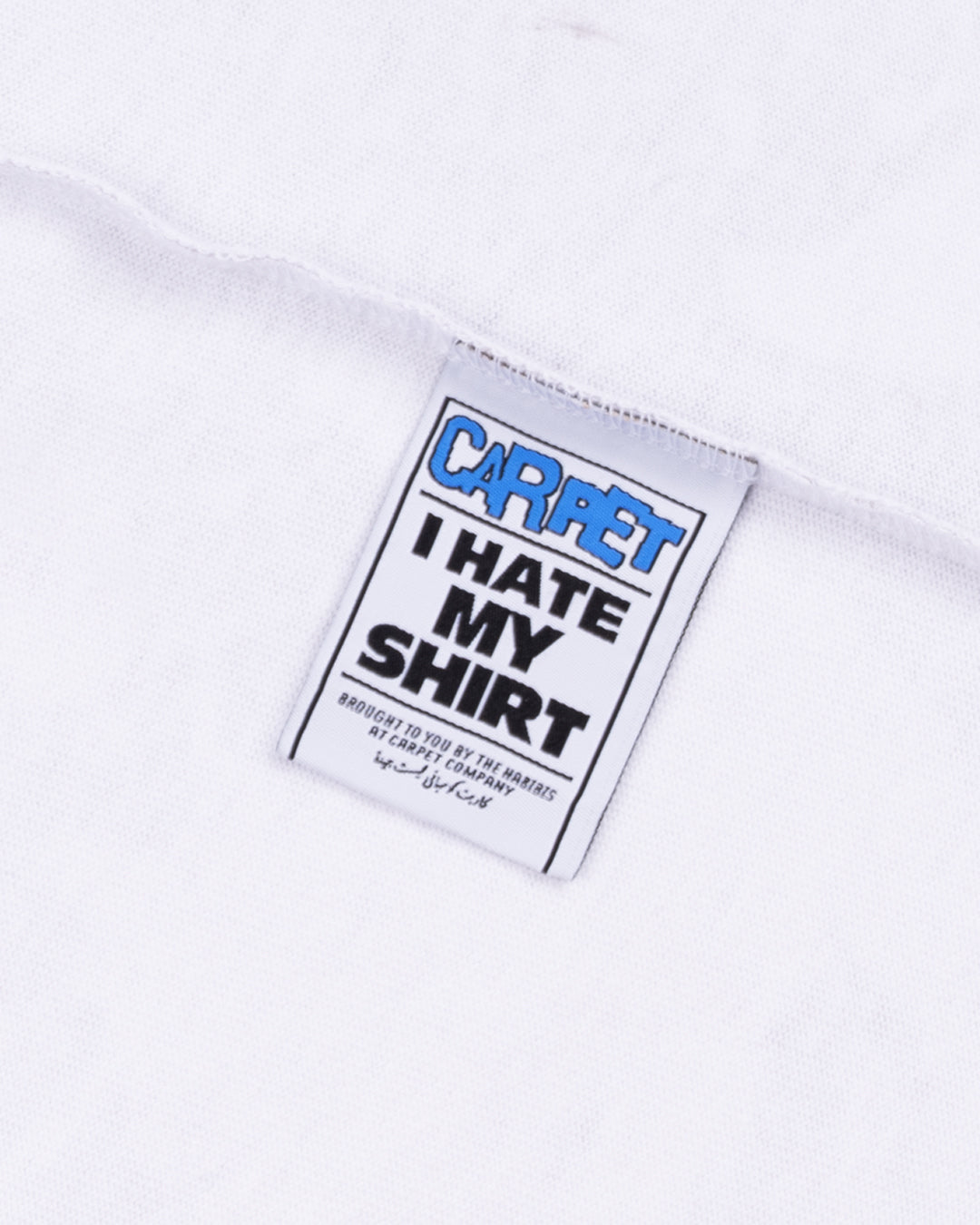 A Eckhaus Latta Shirt pictured on a model in front of a white background. The title of the product is Eckhaus Latta Eclipse Turtleneck - Stone and the image was taken by 199A®.